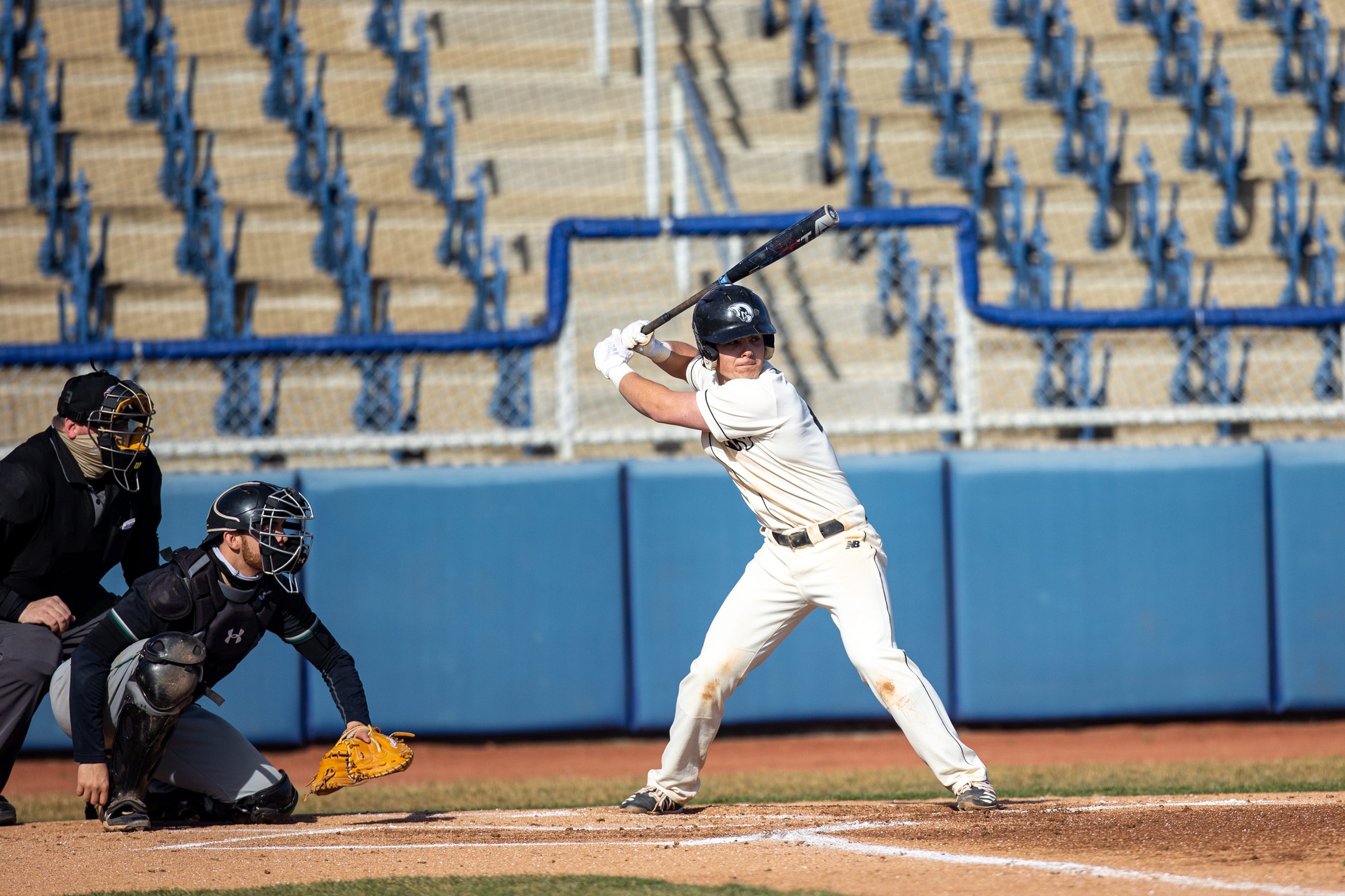 action photo of RC baseball player hitting at the plate