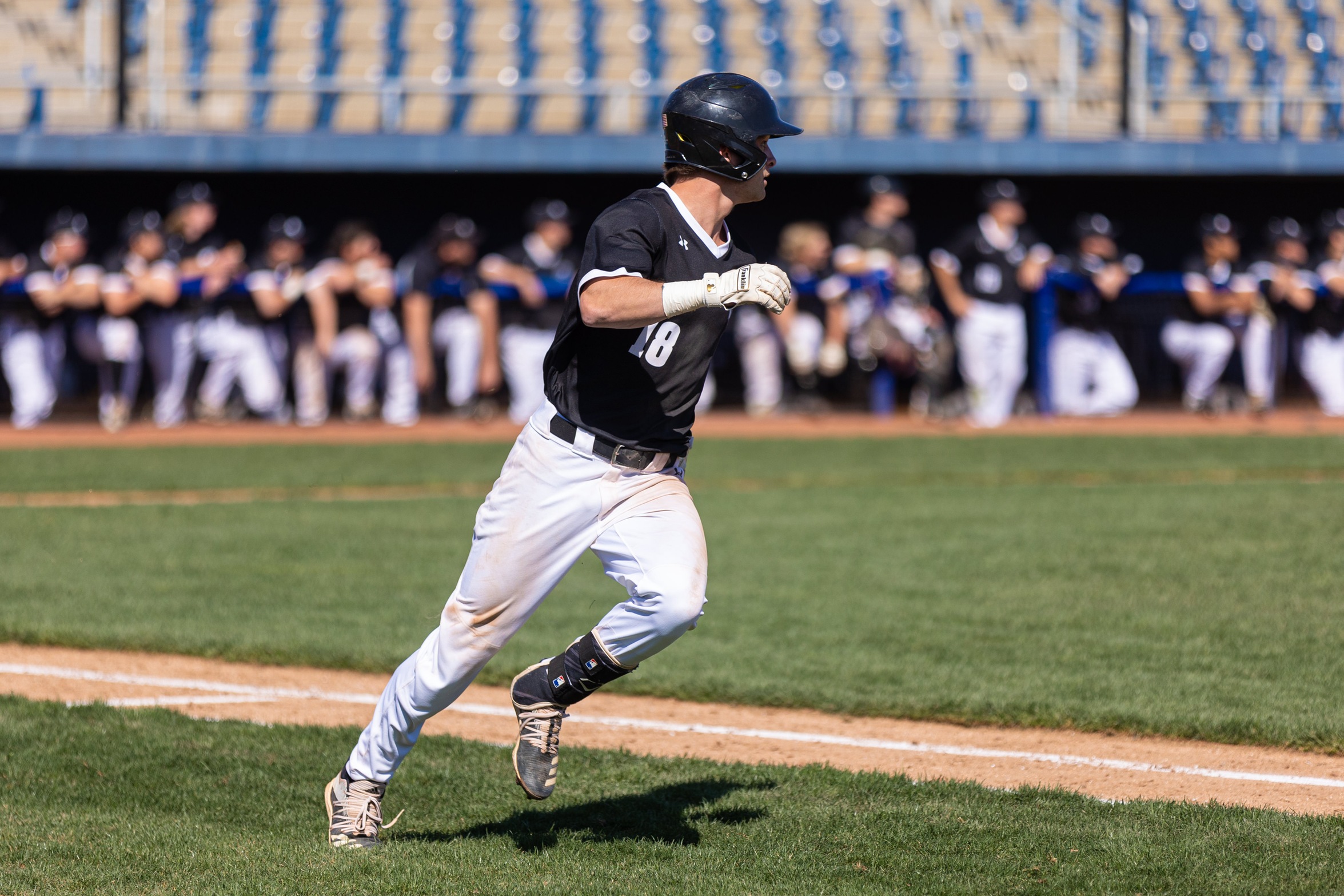 action photo of RC baseball player Will Smith rounding first base