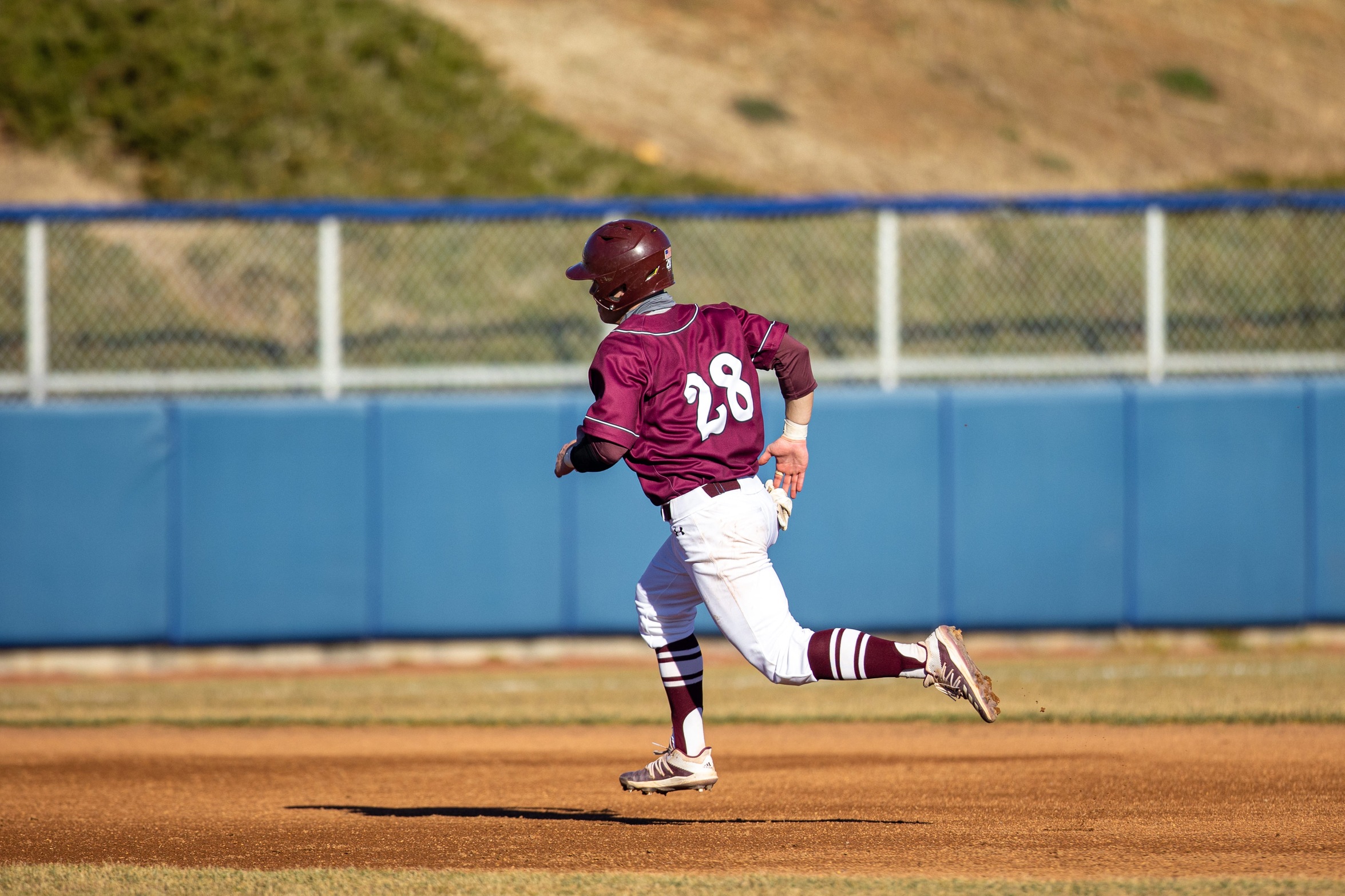 action photo of RC baseball player Jonny Wall running the bases