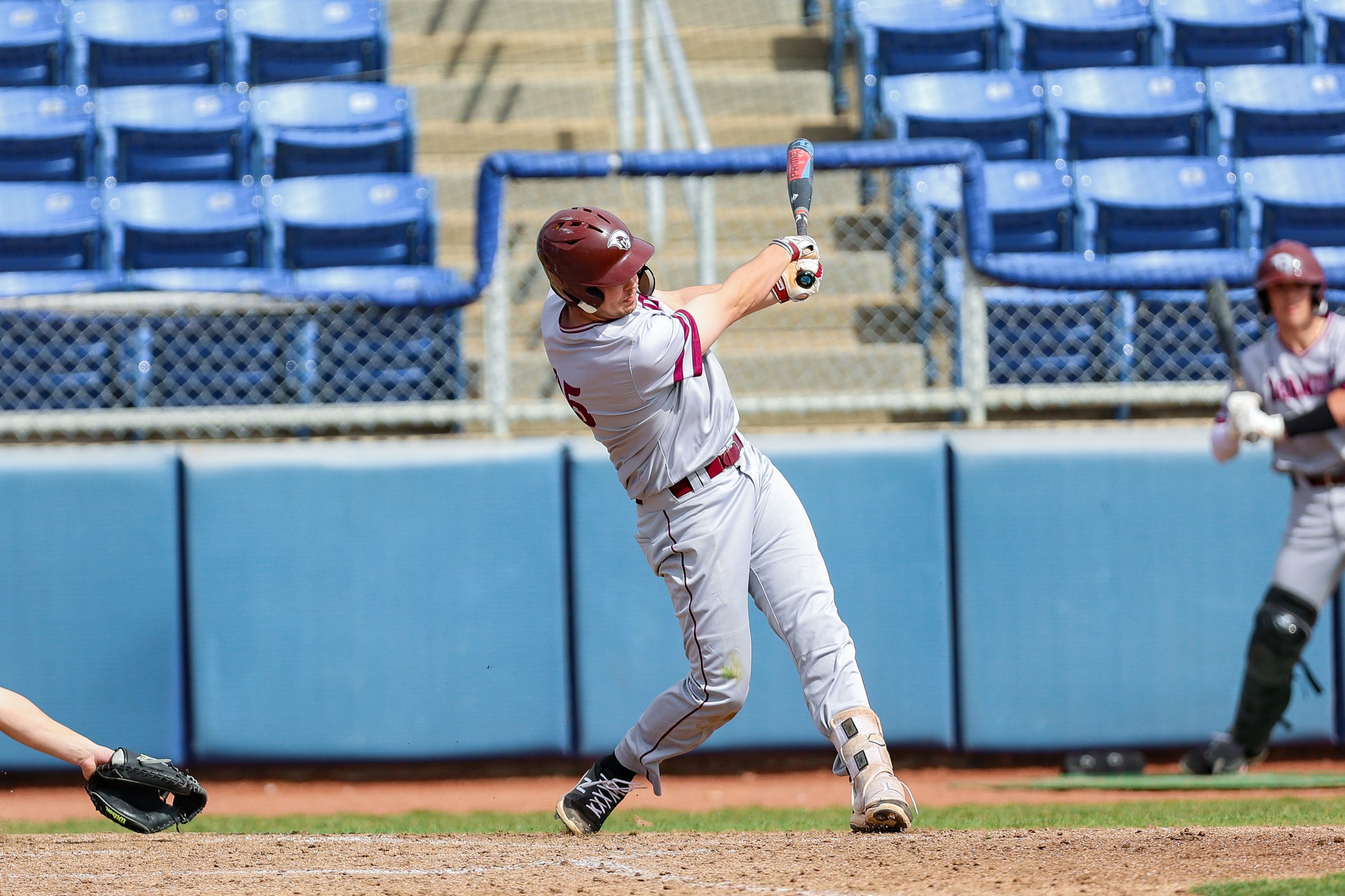 action photo of RC baseball Owen Lawn hitting