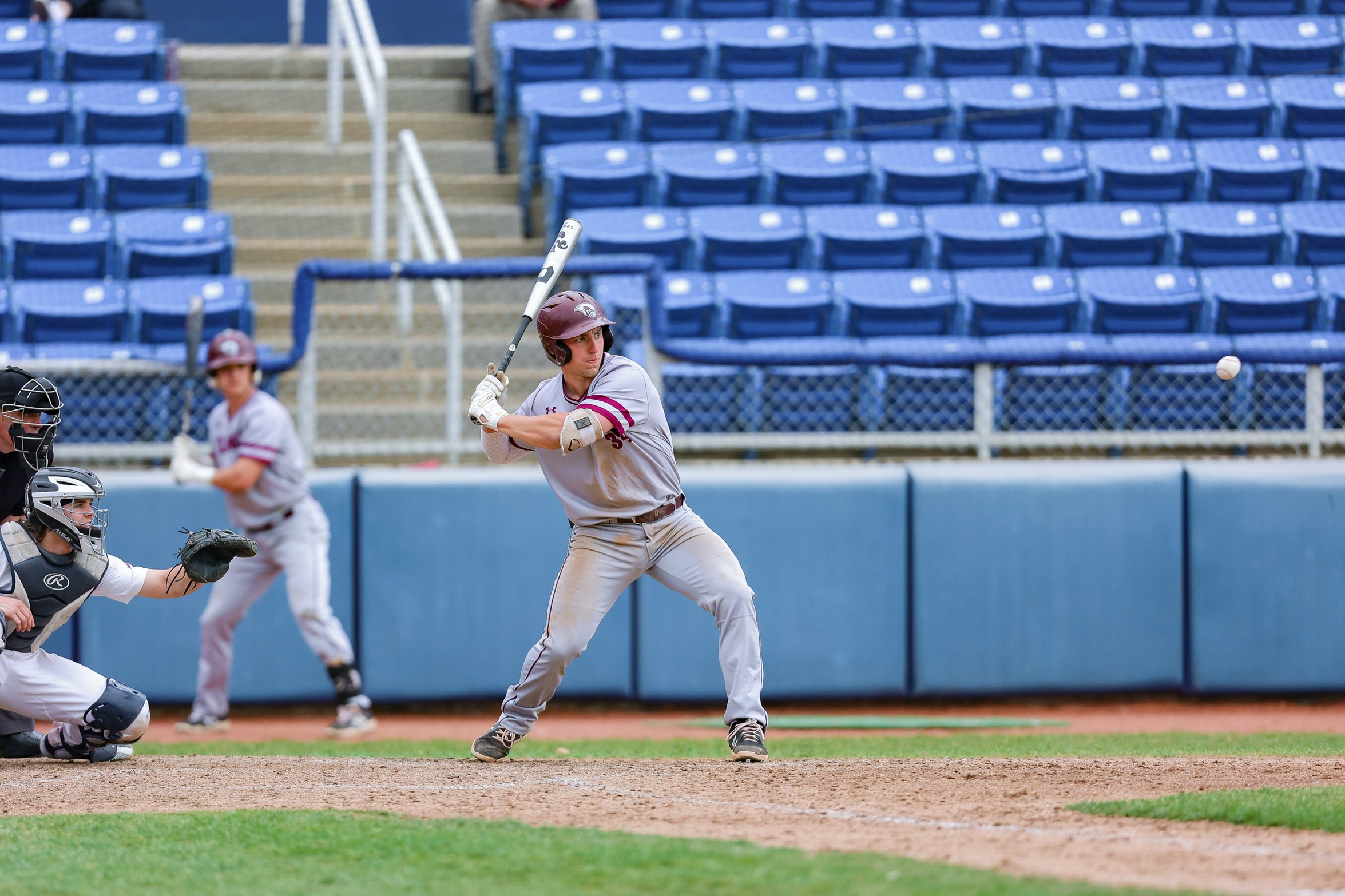 action photo of RC baseball player PK Cocolis hitting
