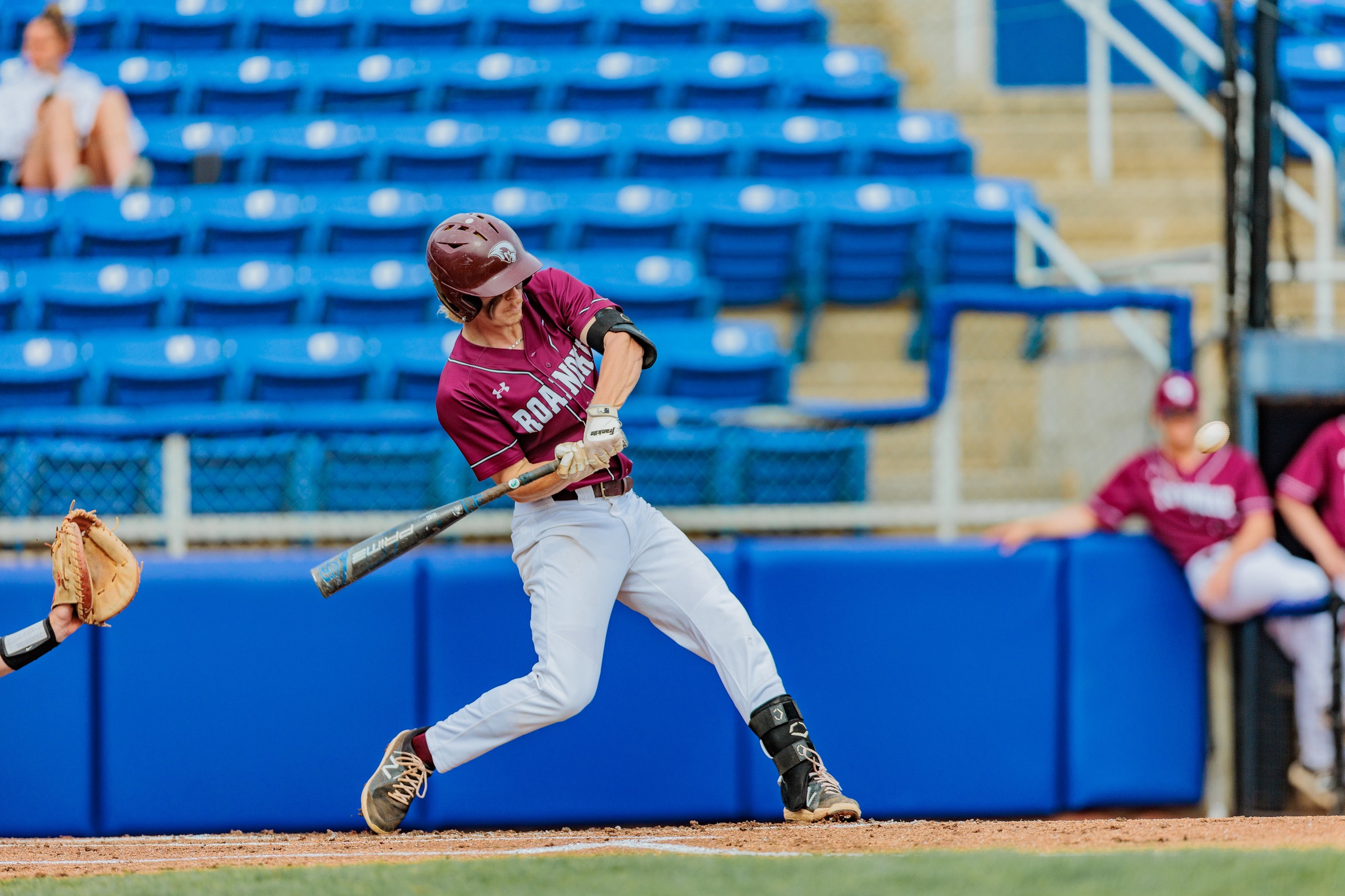 action photo of RC baseball player Conner Butler hitting