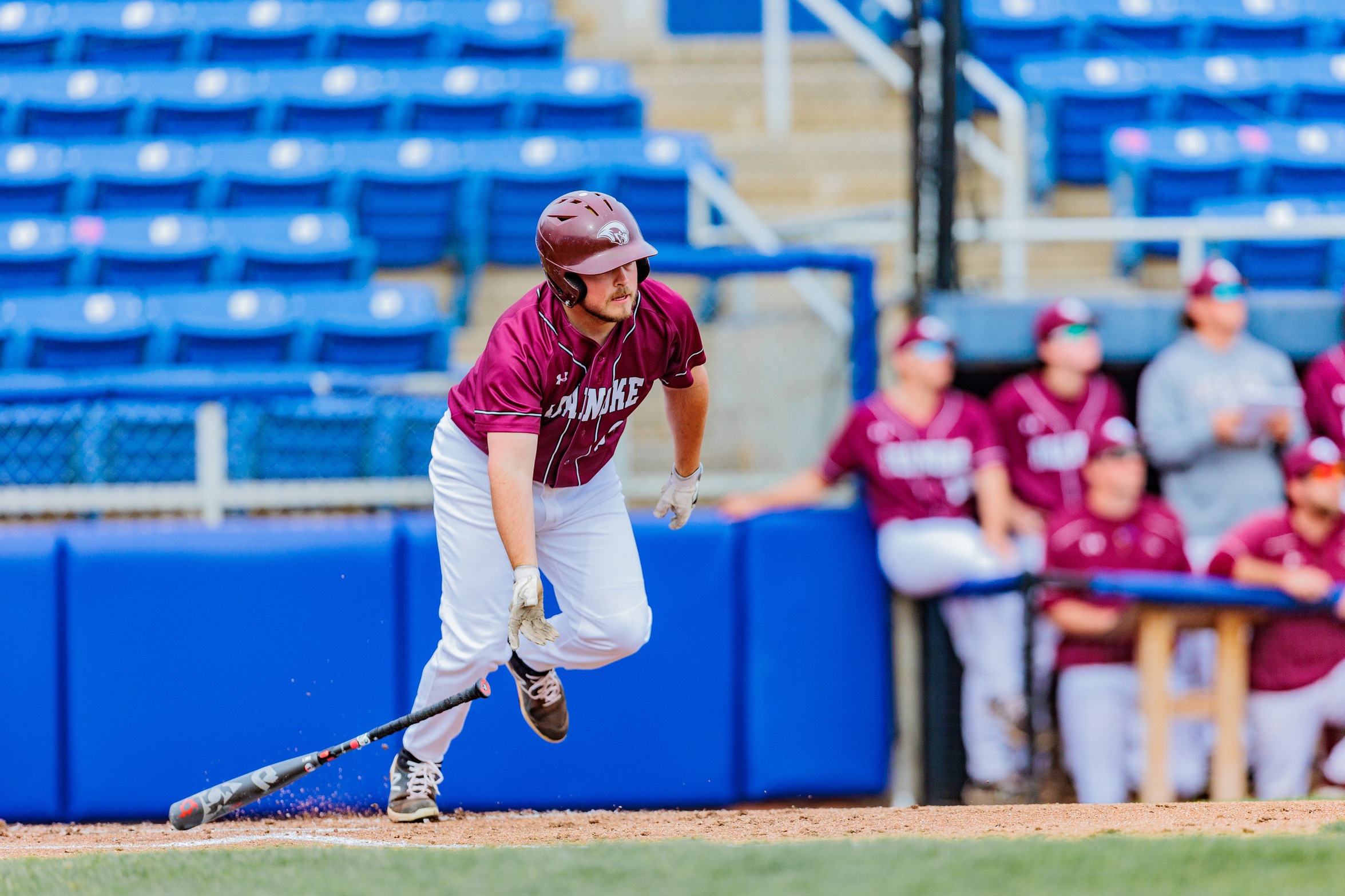 action photo of RC baseball player Hunter Andrews with a base hit
