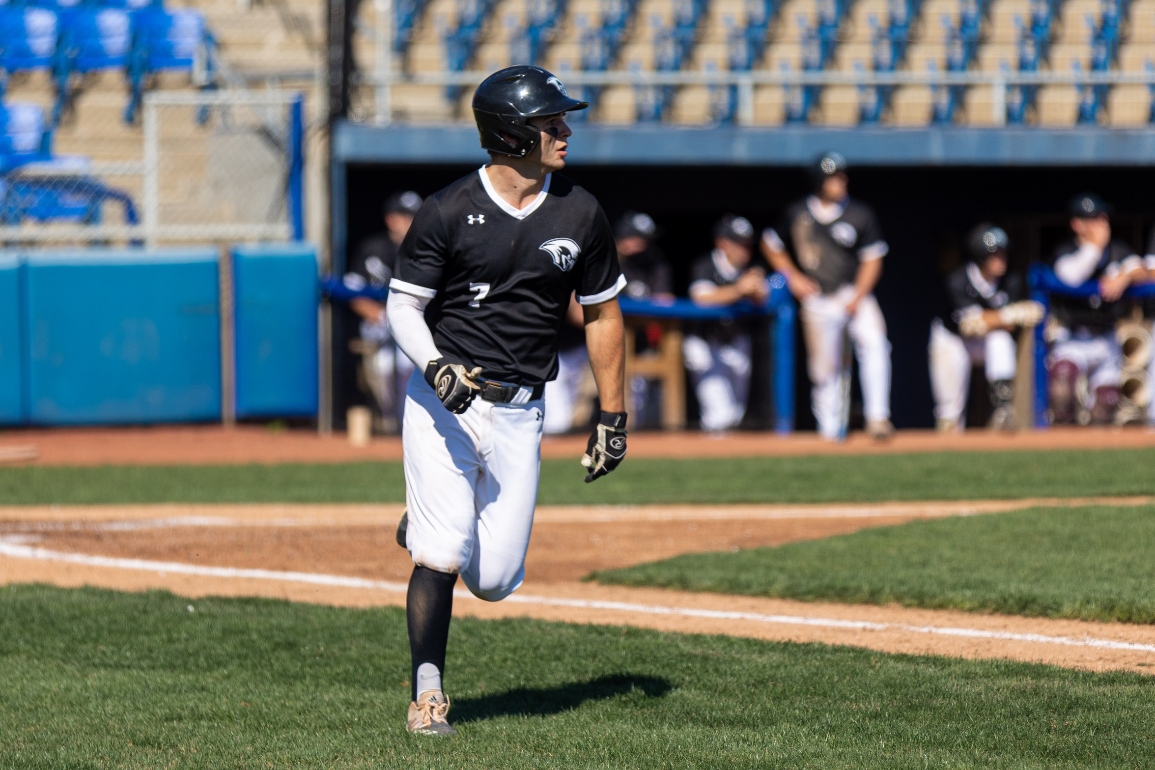 action photo of RC baseball player Mason Staz running to first