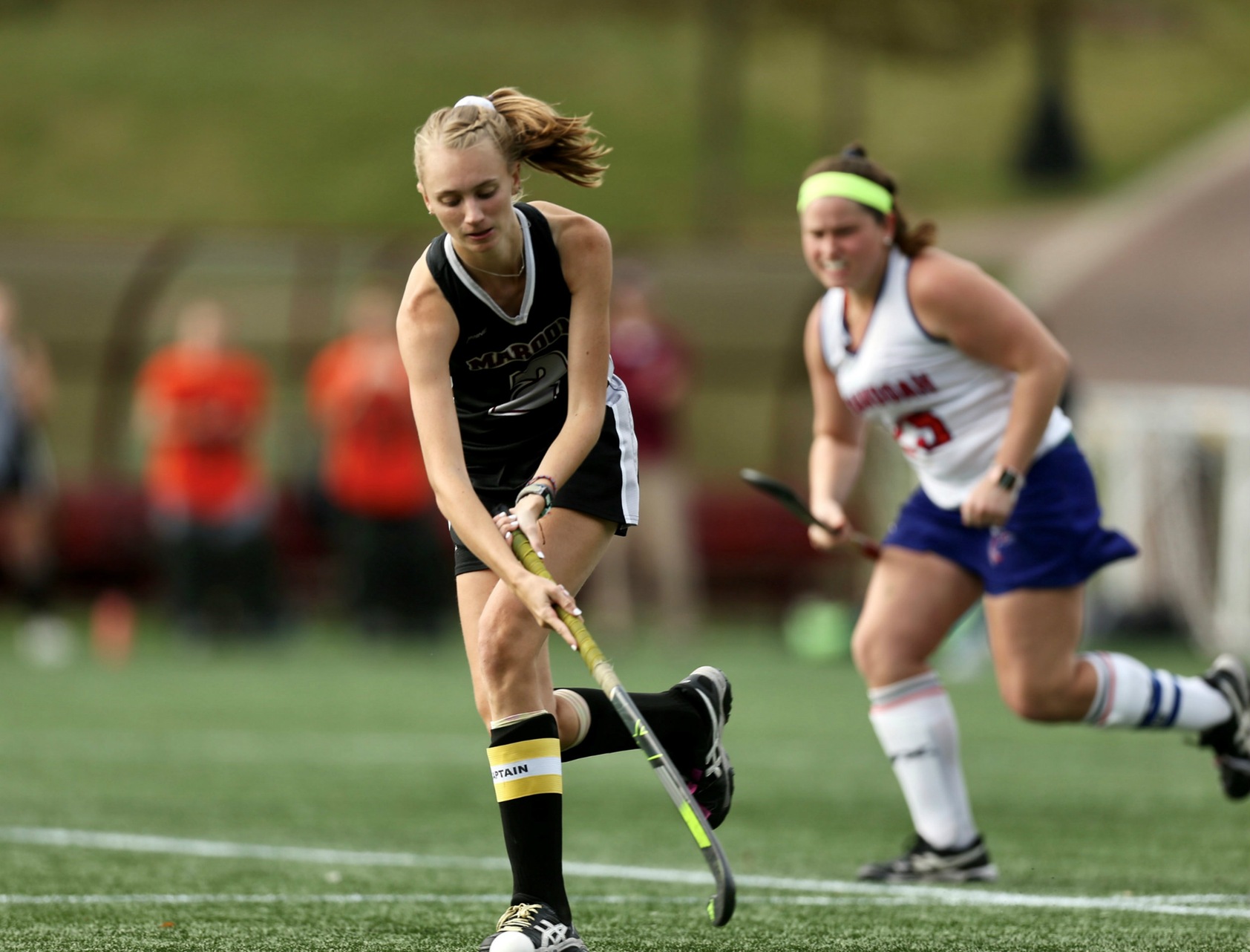 action photo of Roanoke filed hockey player Emilee Wooten