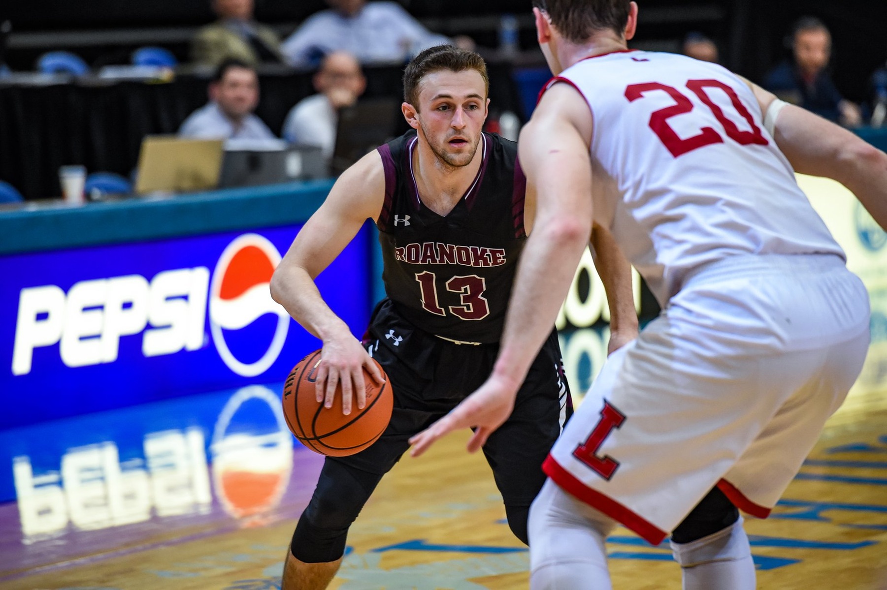 action photo of RC basketball player Tripp Greene