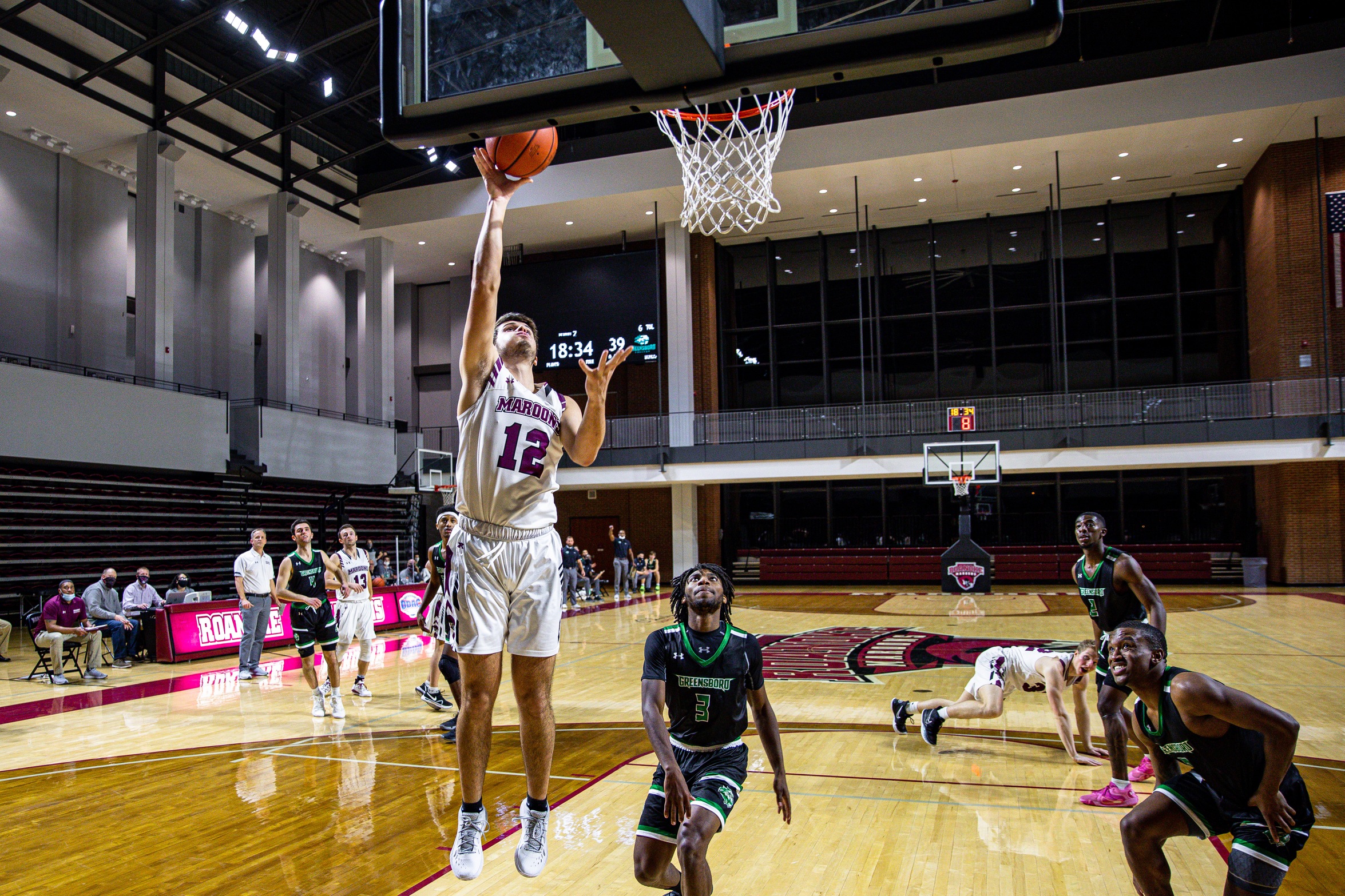 action photo of RC basketball player Justin Kuthan