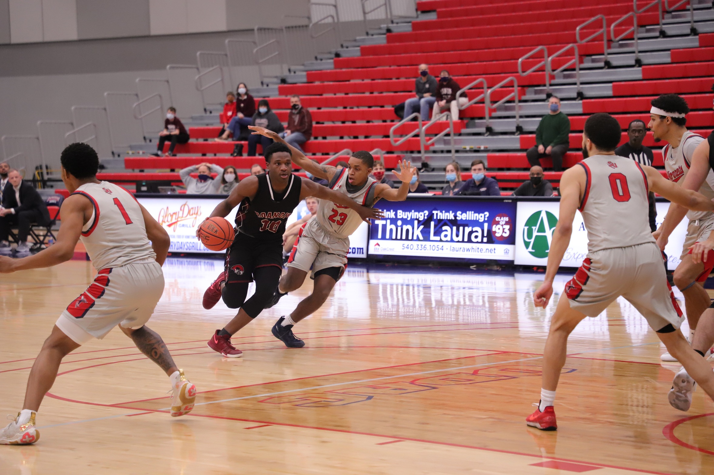 action photo of RC MBB Efosa U-Edosomwan dribbling into the lane