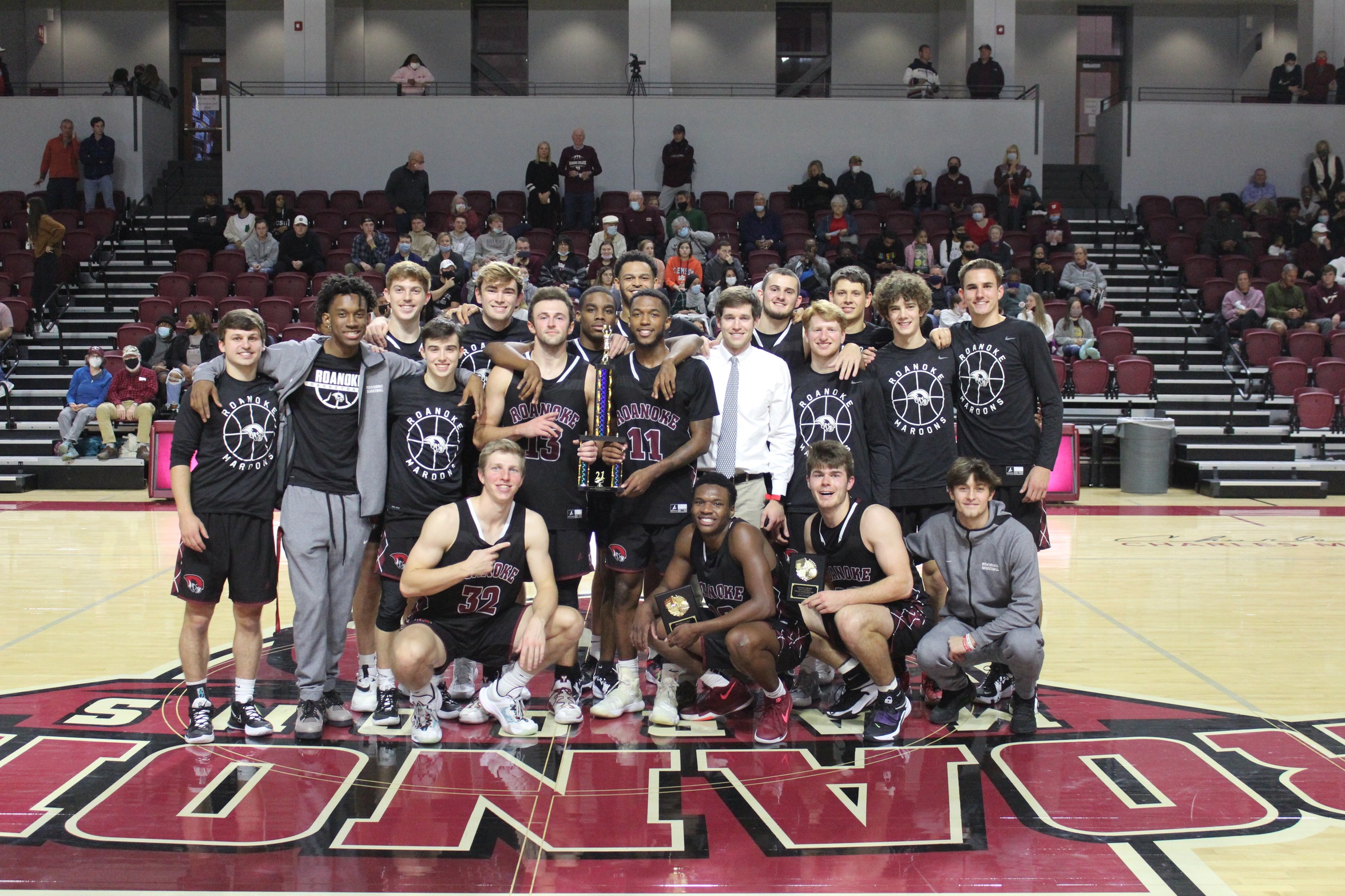 team shot of the RC basketball team after winning a tournament