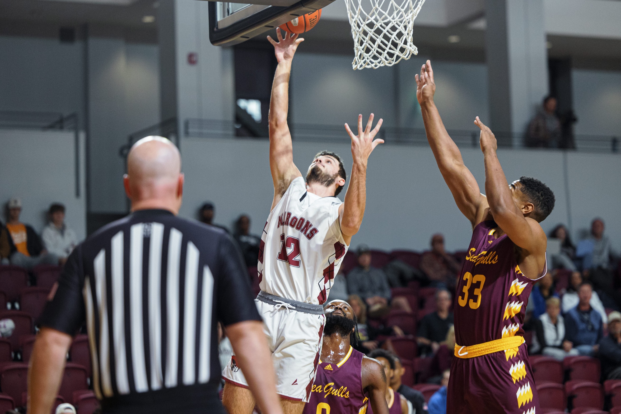 Kuthan Double-Double Leads Maroons Past Bridgewater in ODAC Opener 78-60.