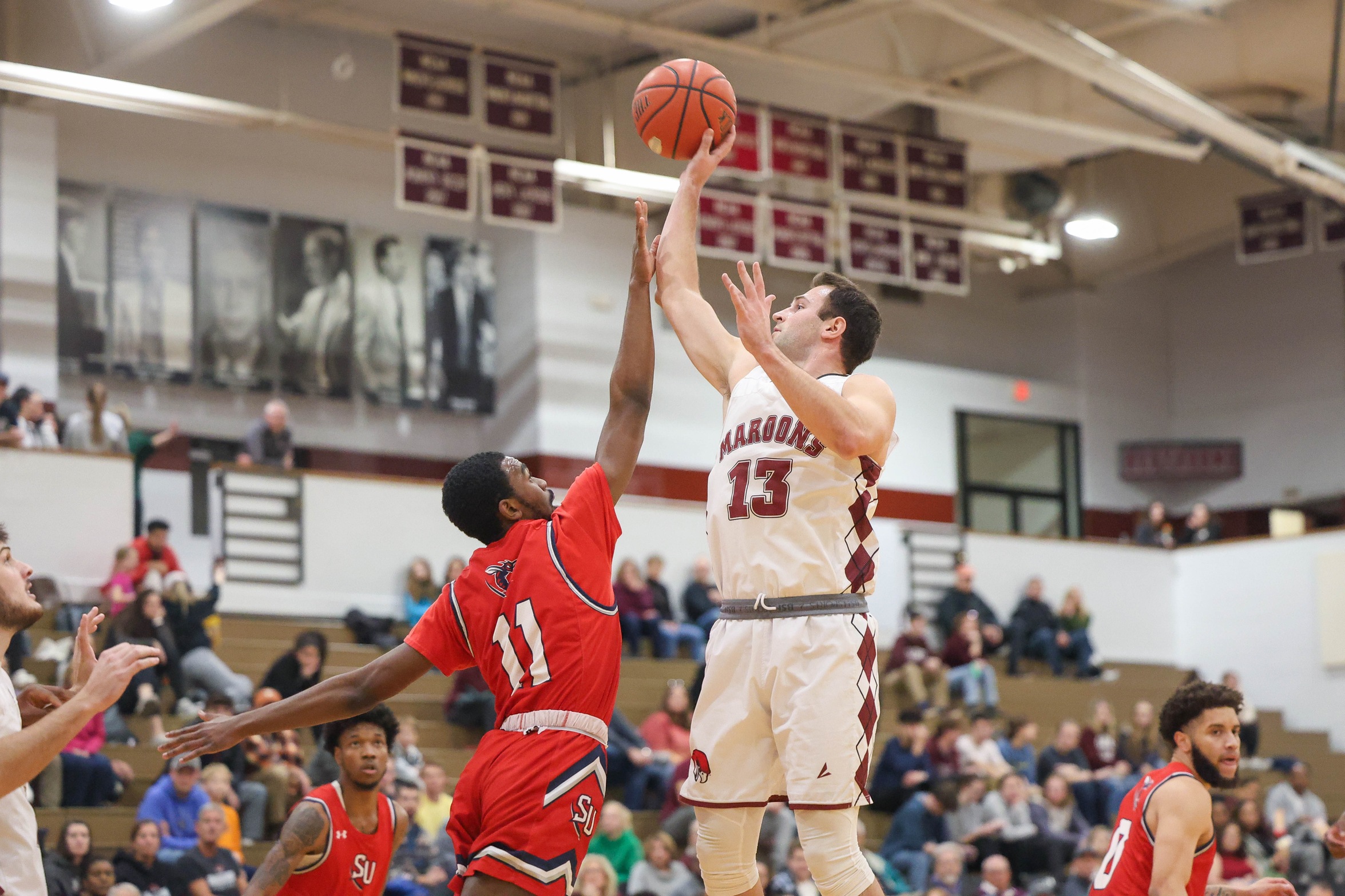 #13 Tripp Greene finished with 13 points while scoring his 1,000th career point.
