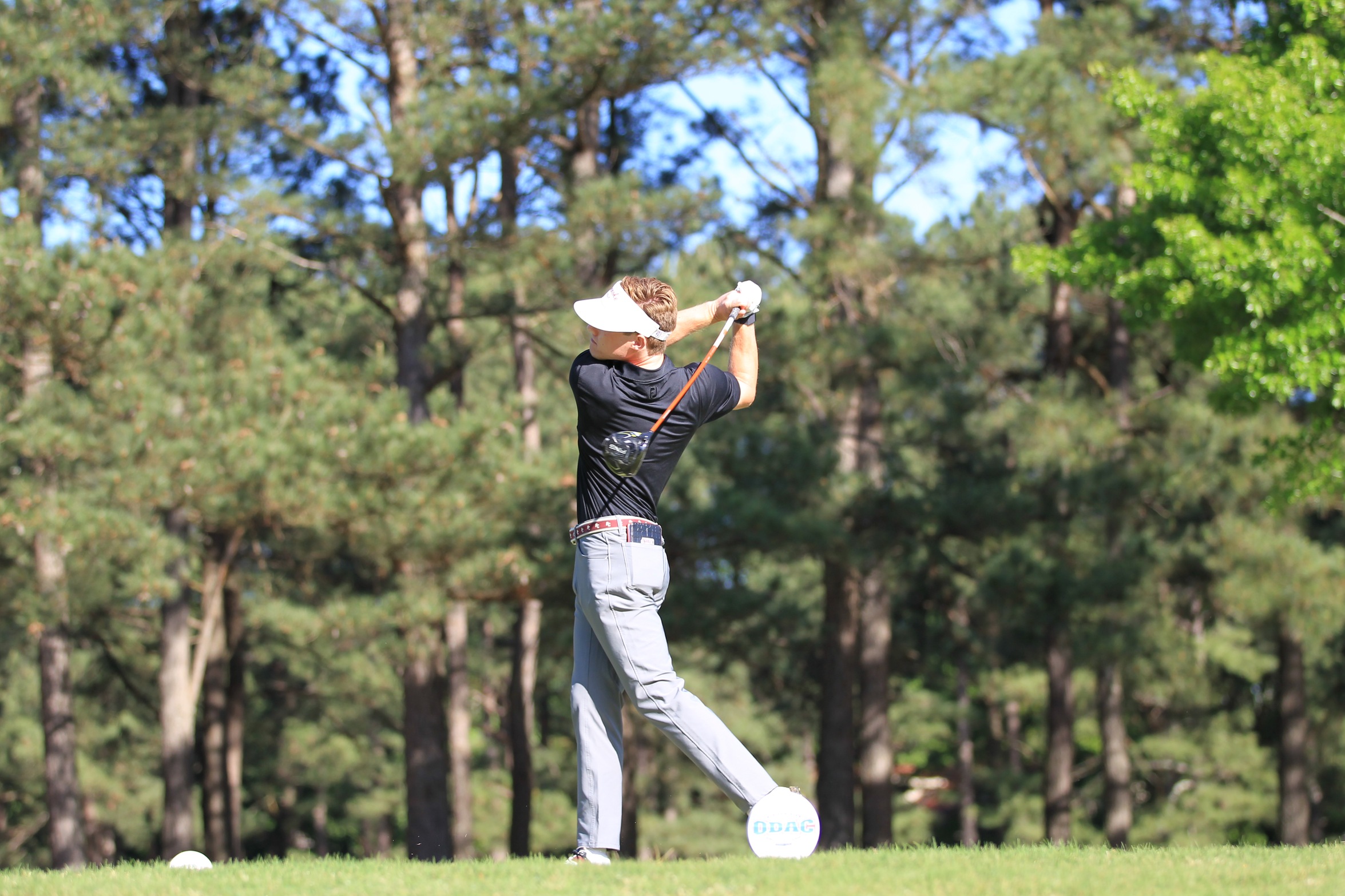 RC golfer Palmer Cuny with a tee shot
