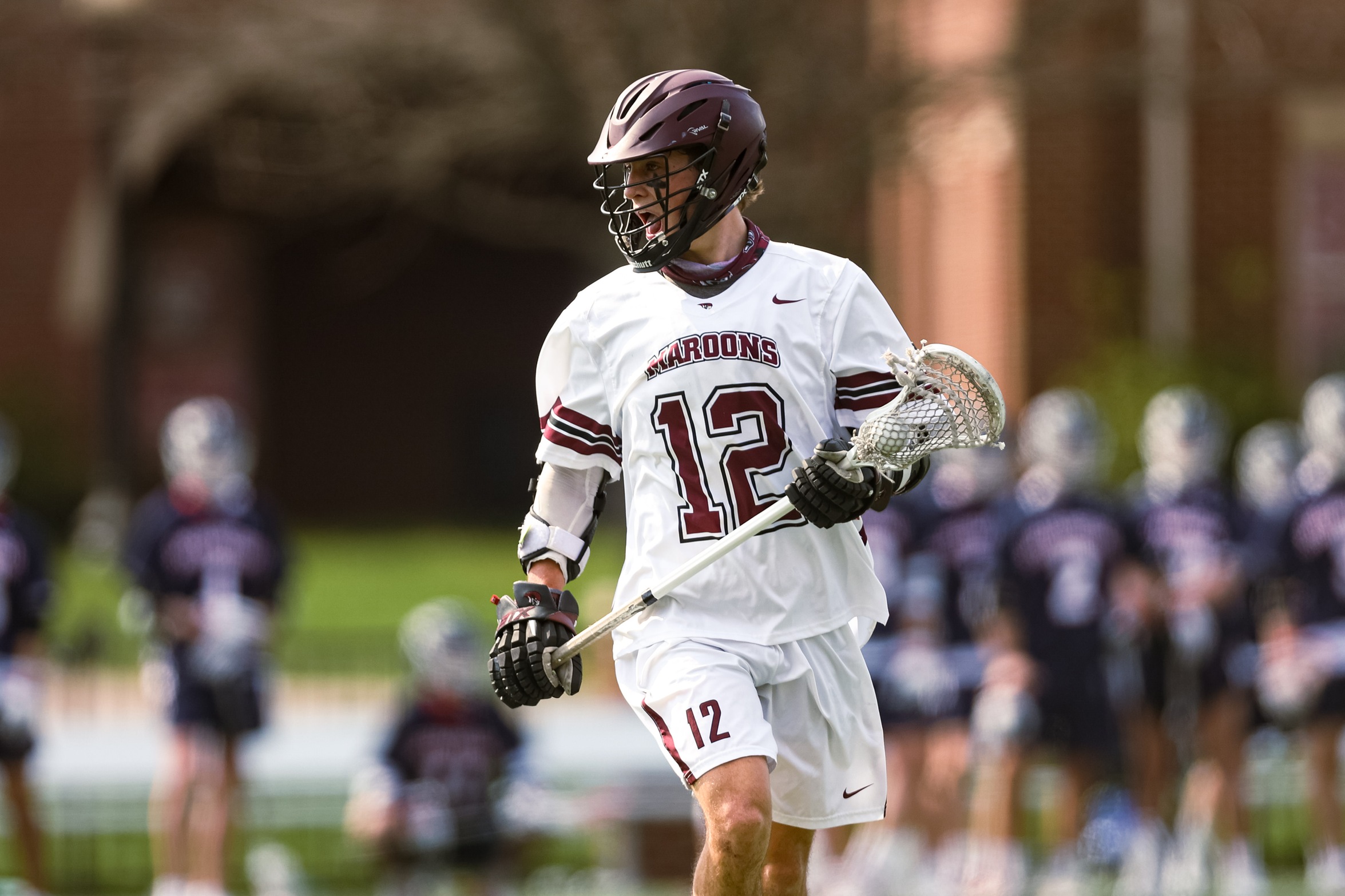 action photo of RC lacrosse player Jay Frye