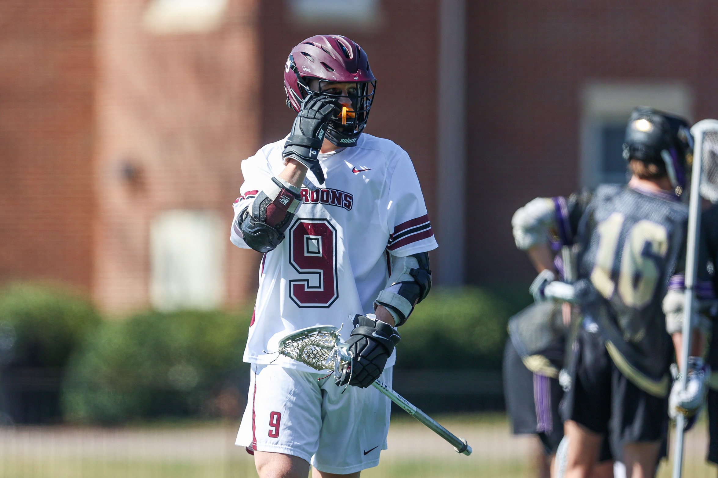 action photo of RC mens lacrosse player Wyatt Whitlow