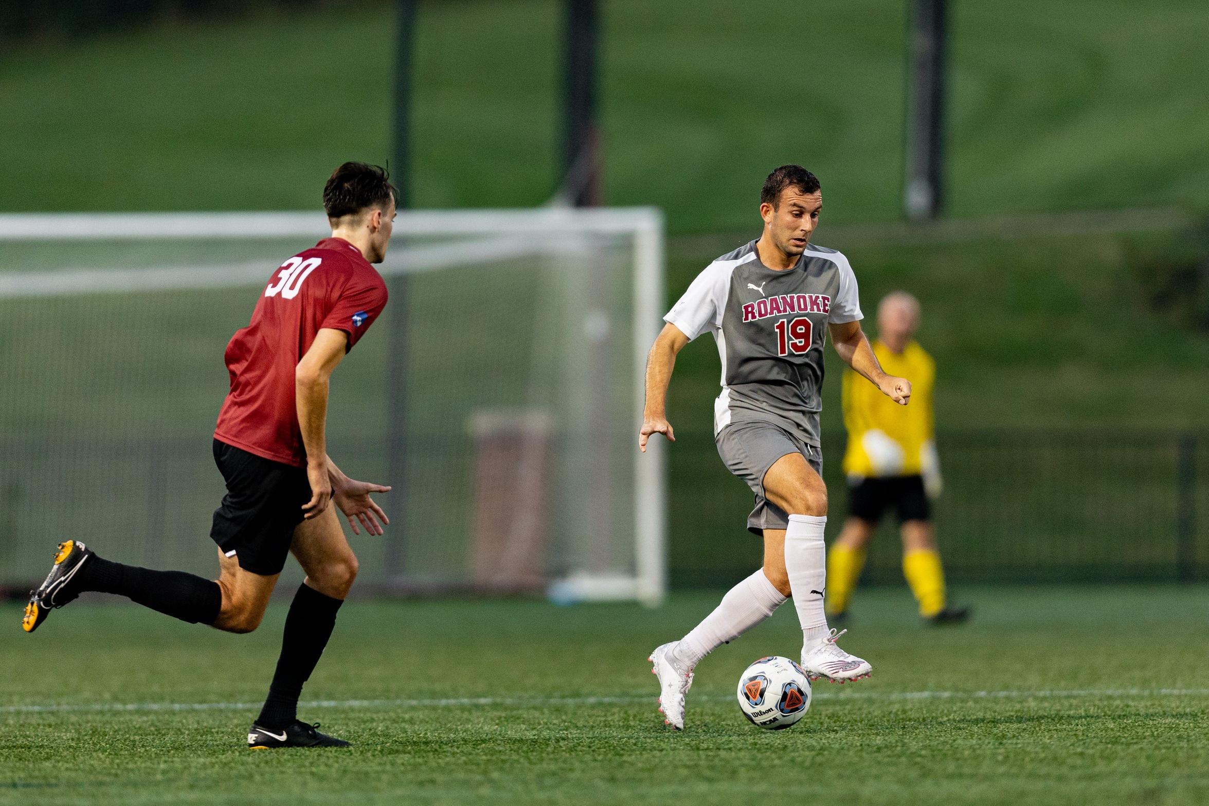 action photo of RC men's soccer striker Liam Camilleri