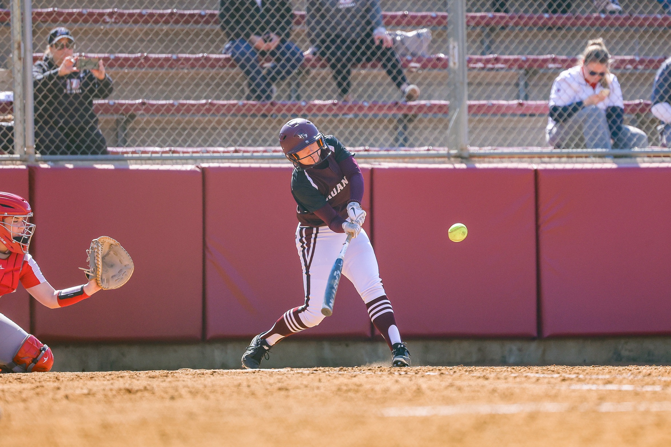 action photo of RC softball hitter Madison Courts
