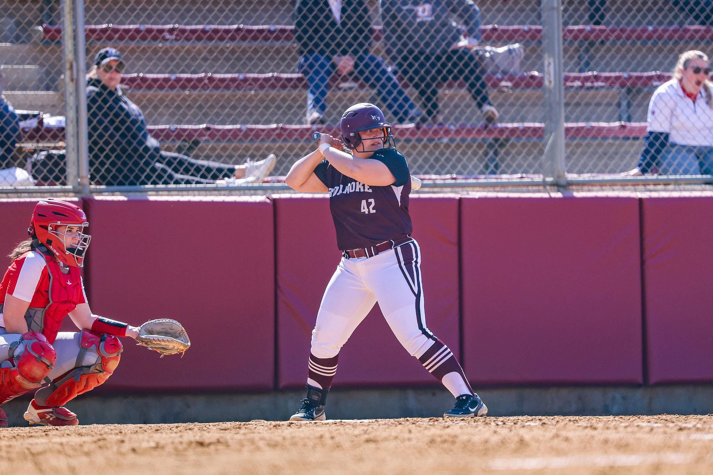 action photo of RC softball player Serenity Bishop hitting