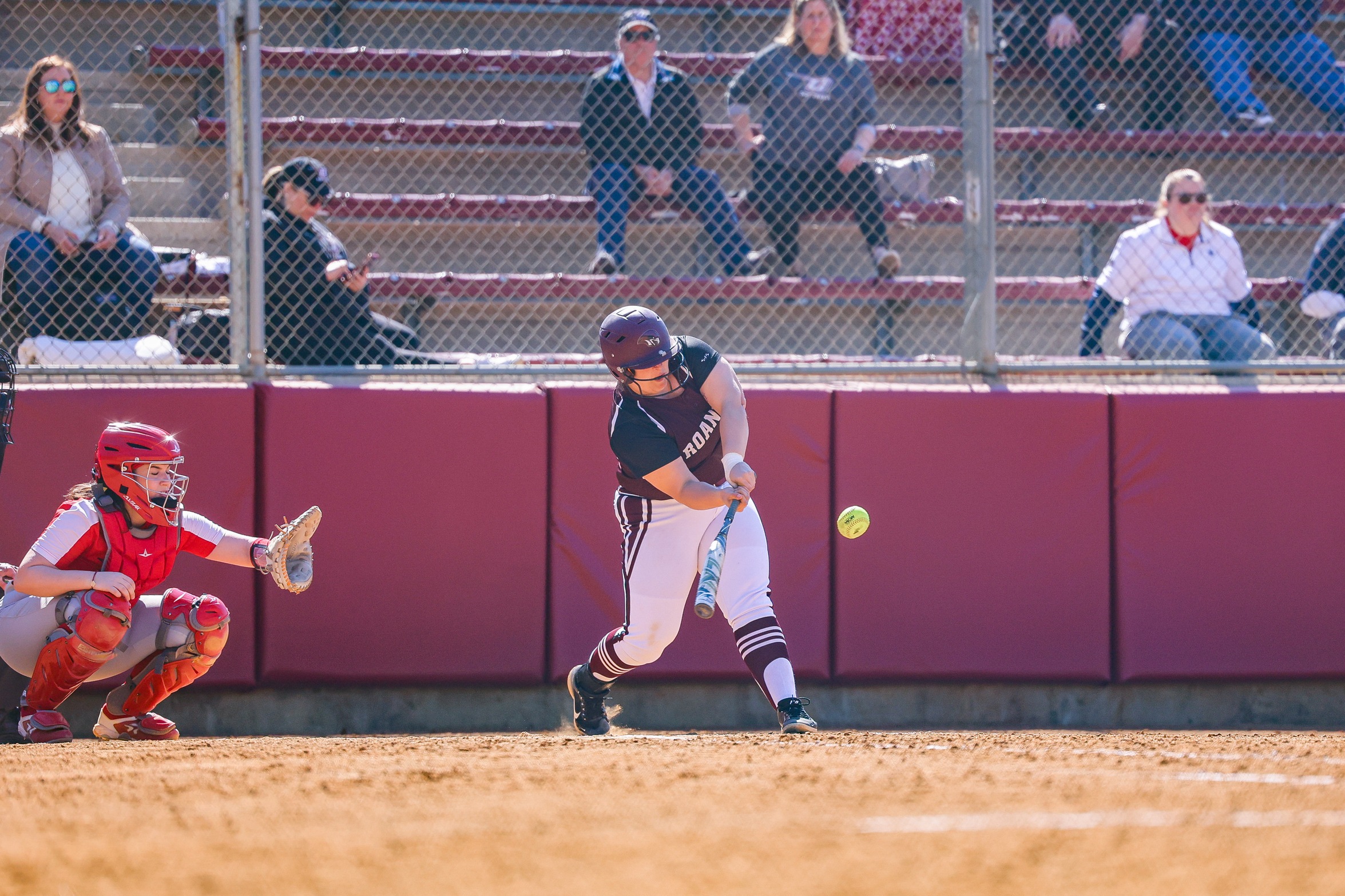 action photo of RC softball Serenity Bishop hitting