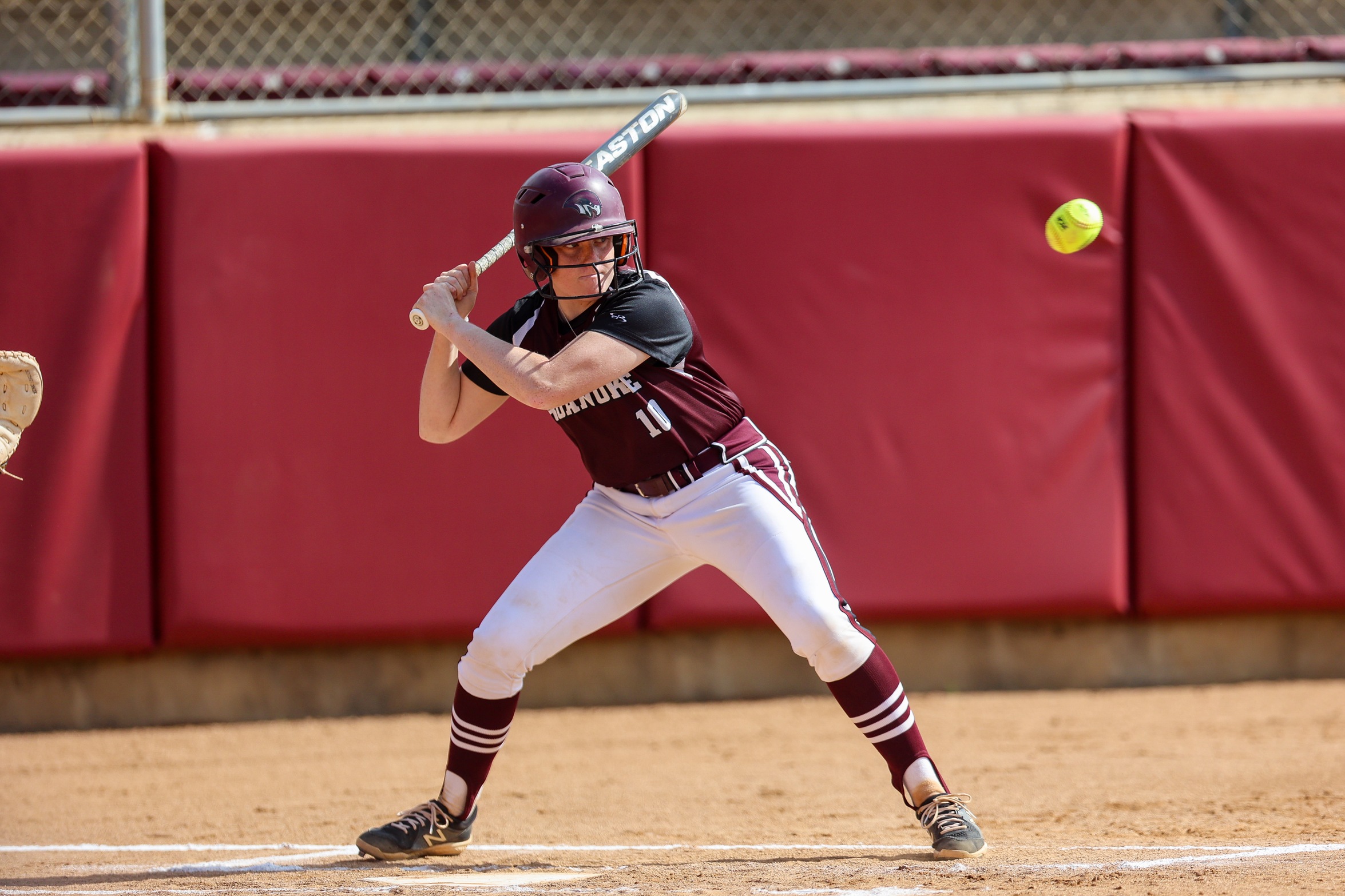 action photo of RC softball hitter Rachel Sirbaugh