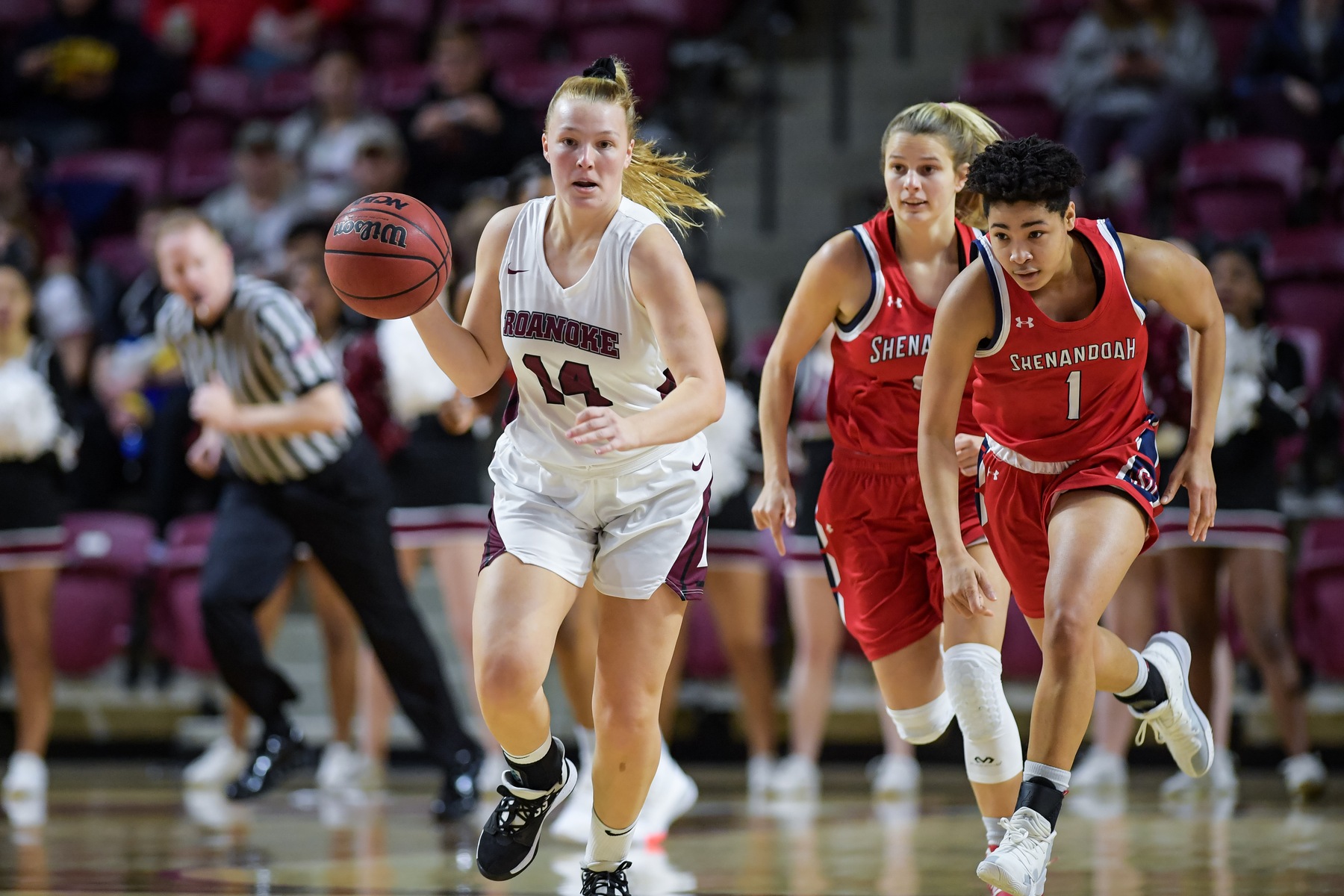 action photo of RC basketball player Morgan Micallef dribbling