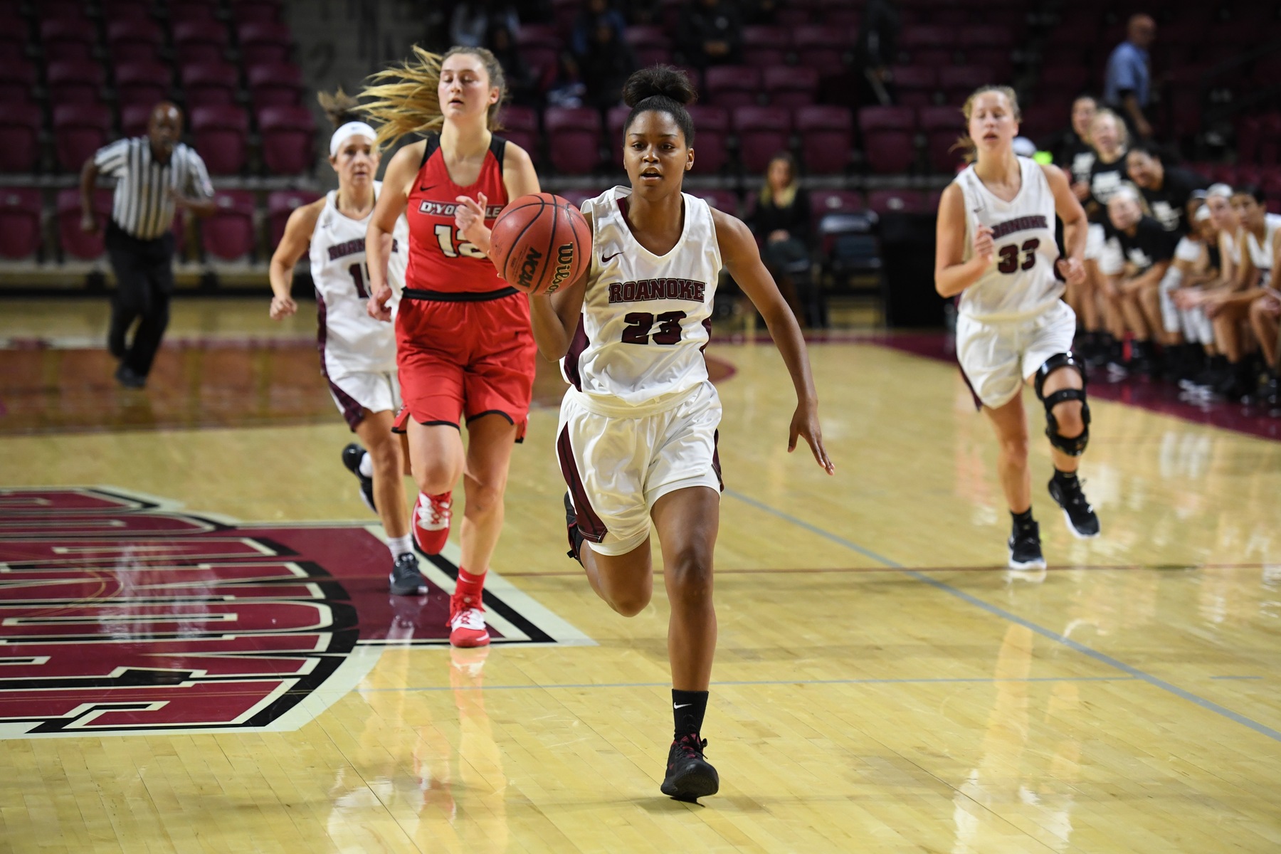 action photo of RC basketball player Ayanna Scarborough