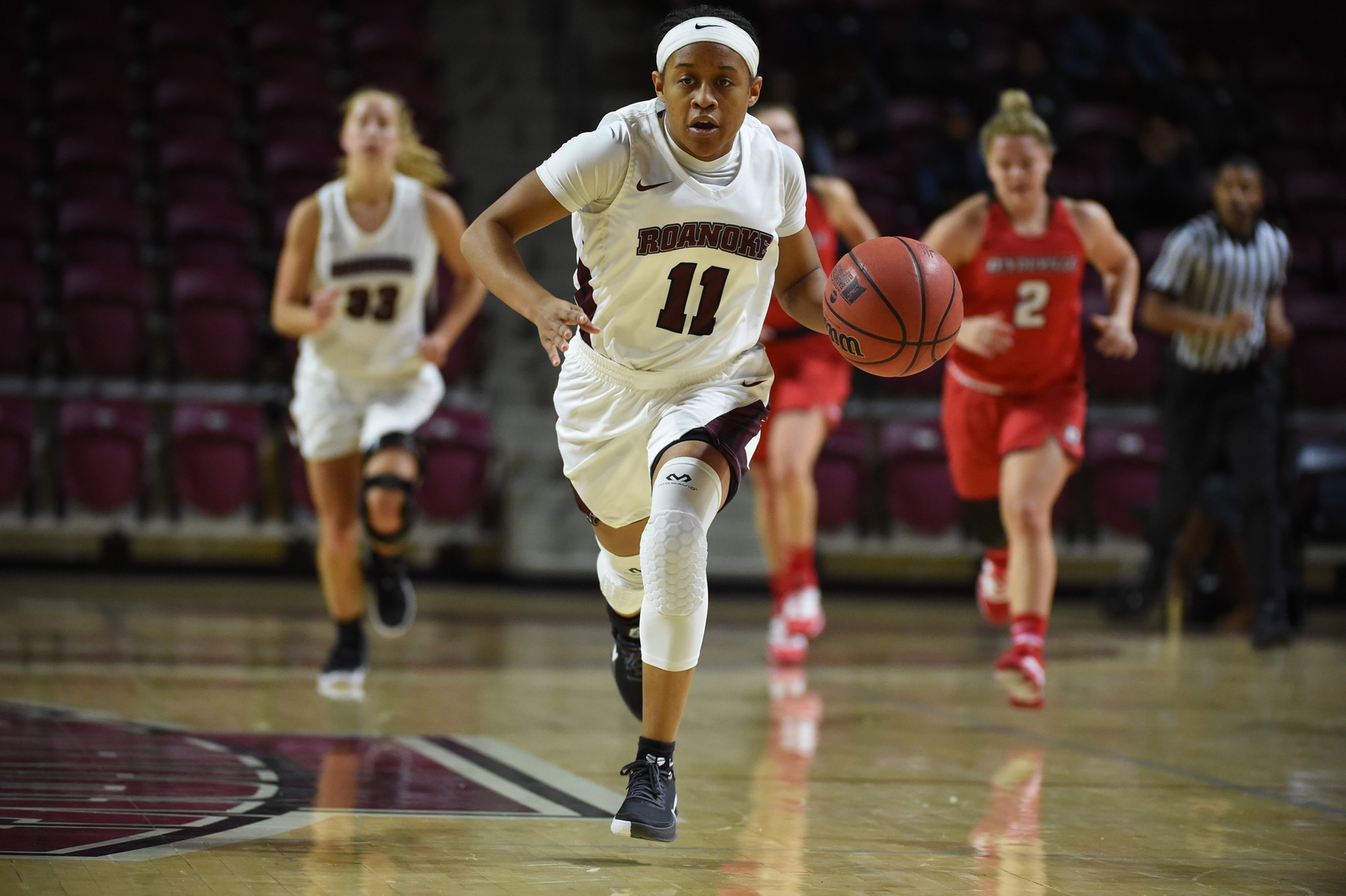 action photo of RC basketball player Whitney Hopson