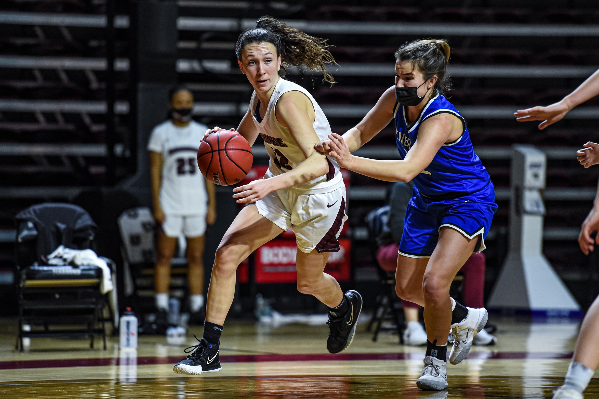 action photo of RC basketball player Kristina Harrel