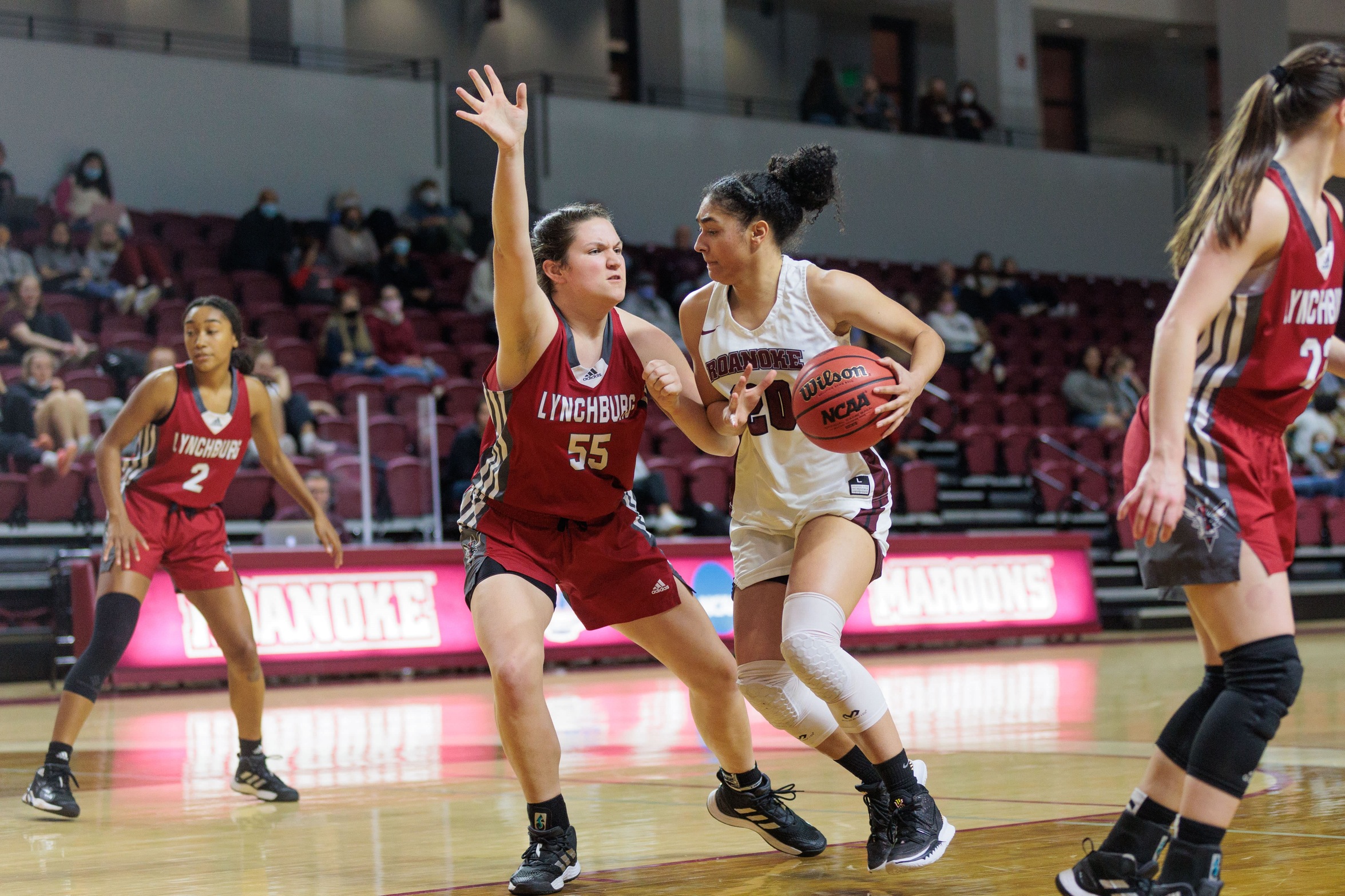 action photo of RC WBB JaBryah Haverkamp driving to the basket