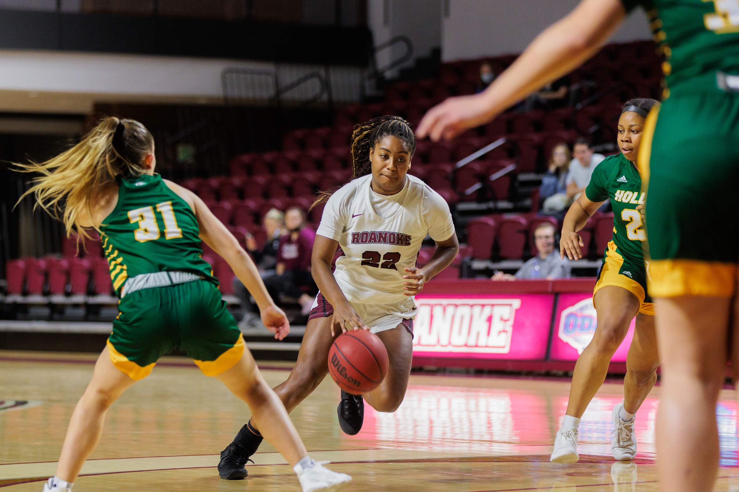 action photo of Roanoke women's basketball player Lauren Keel driving to the basket