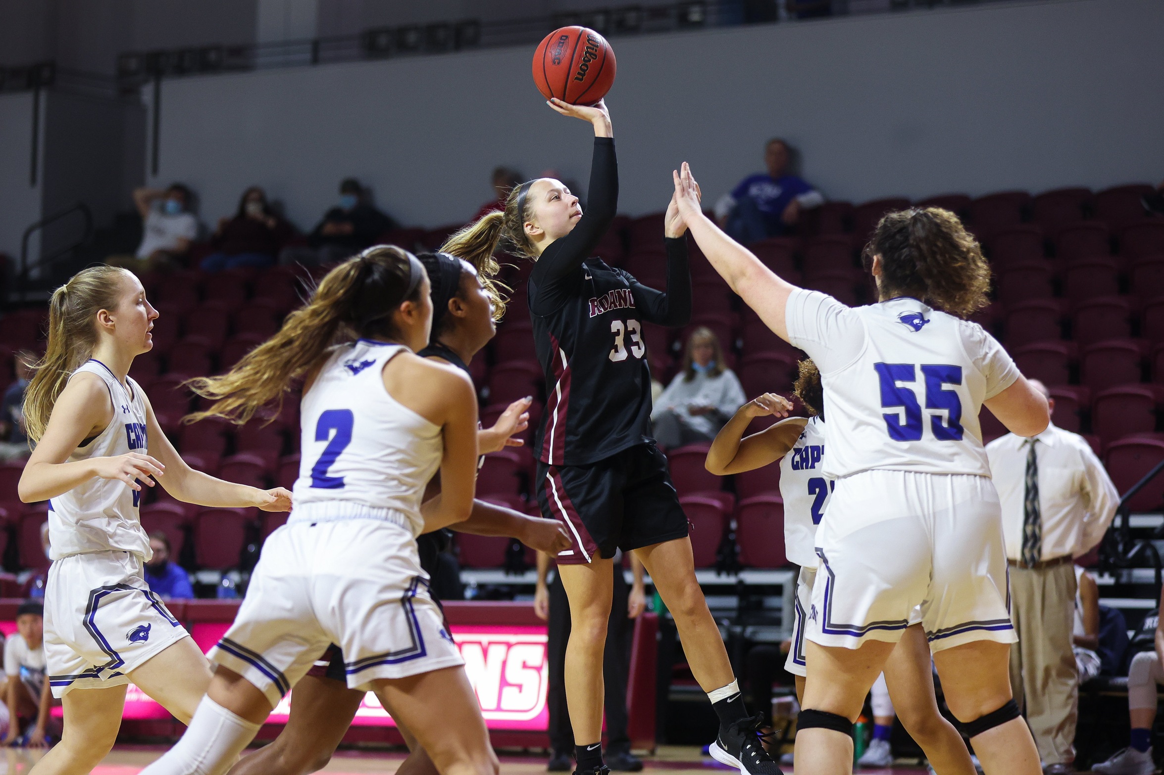 action photo of RC WBB Rose Sande with a jump shot
