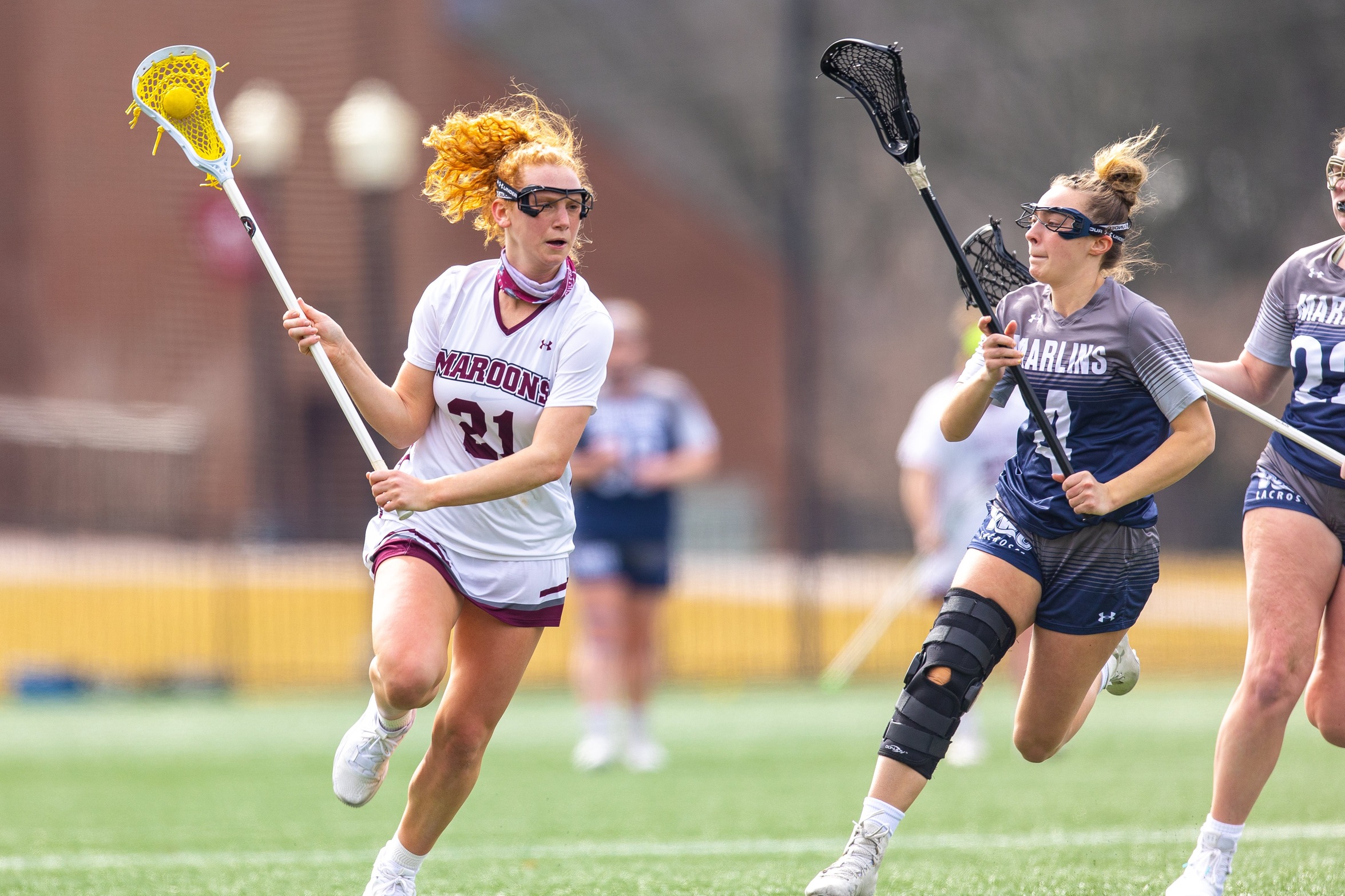 action photo of RC lacrosse player Emerson Foster