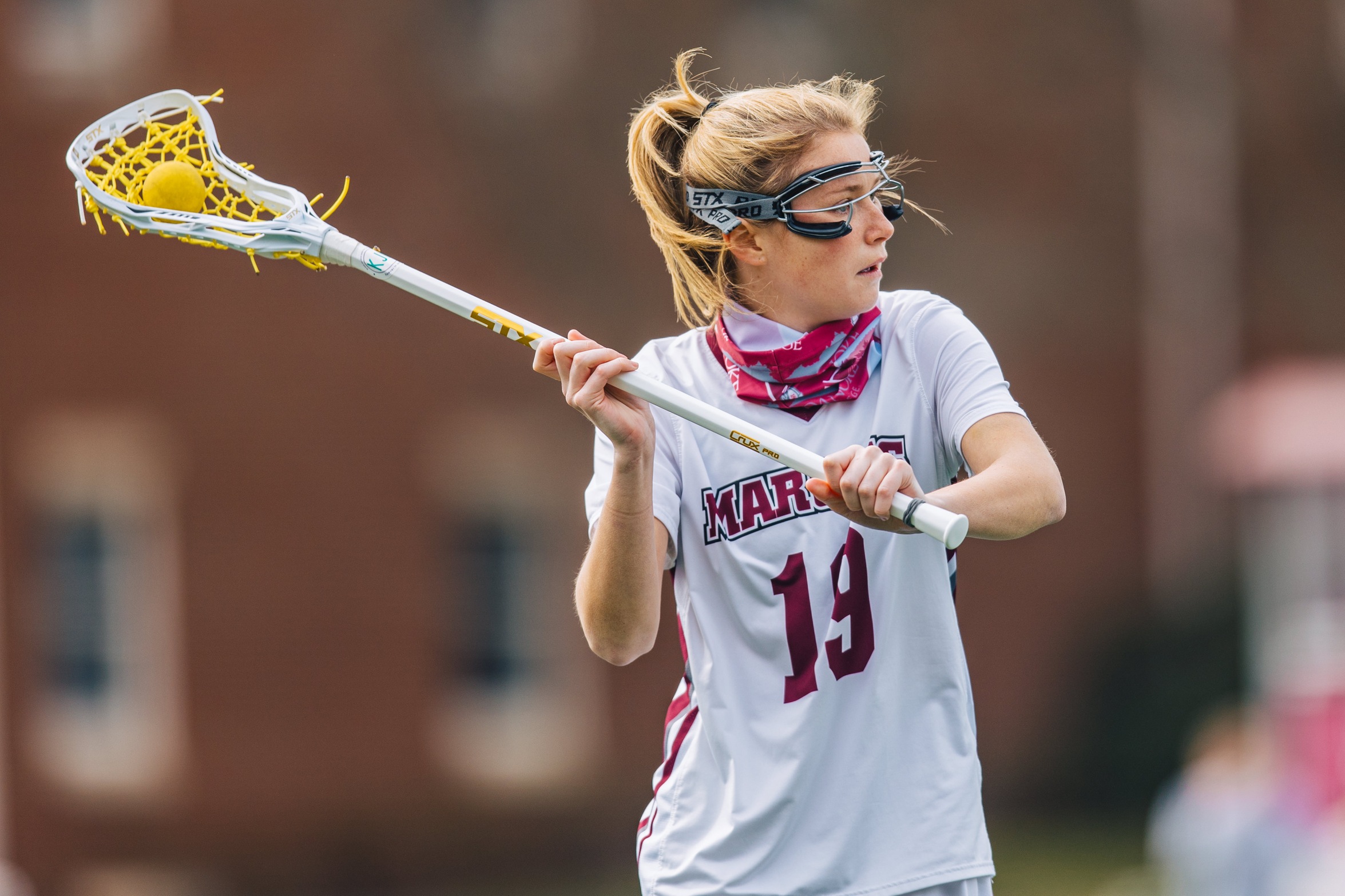 action photo of RC lacrosse player Ellie Armstrong