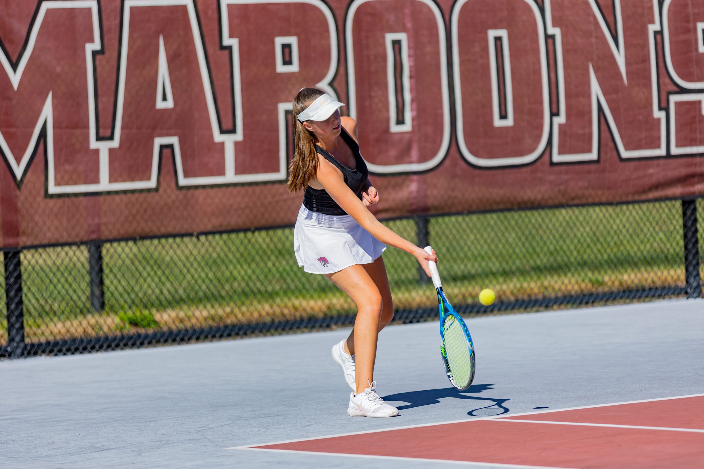 action photo of RC women's tennis player Sophie Baratholomaus