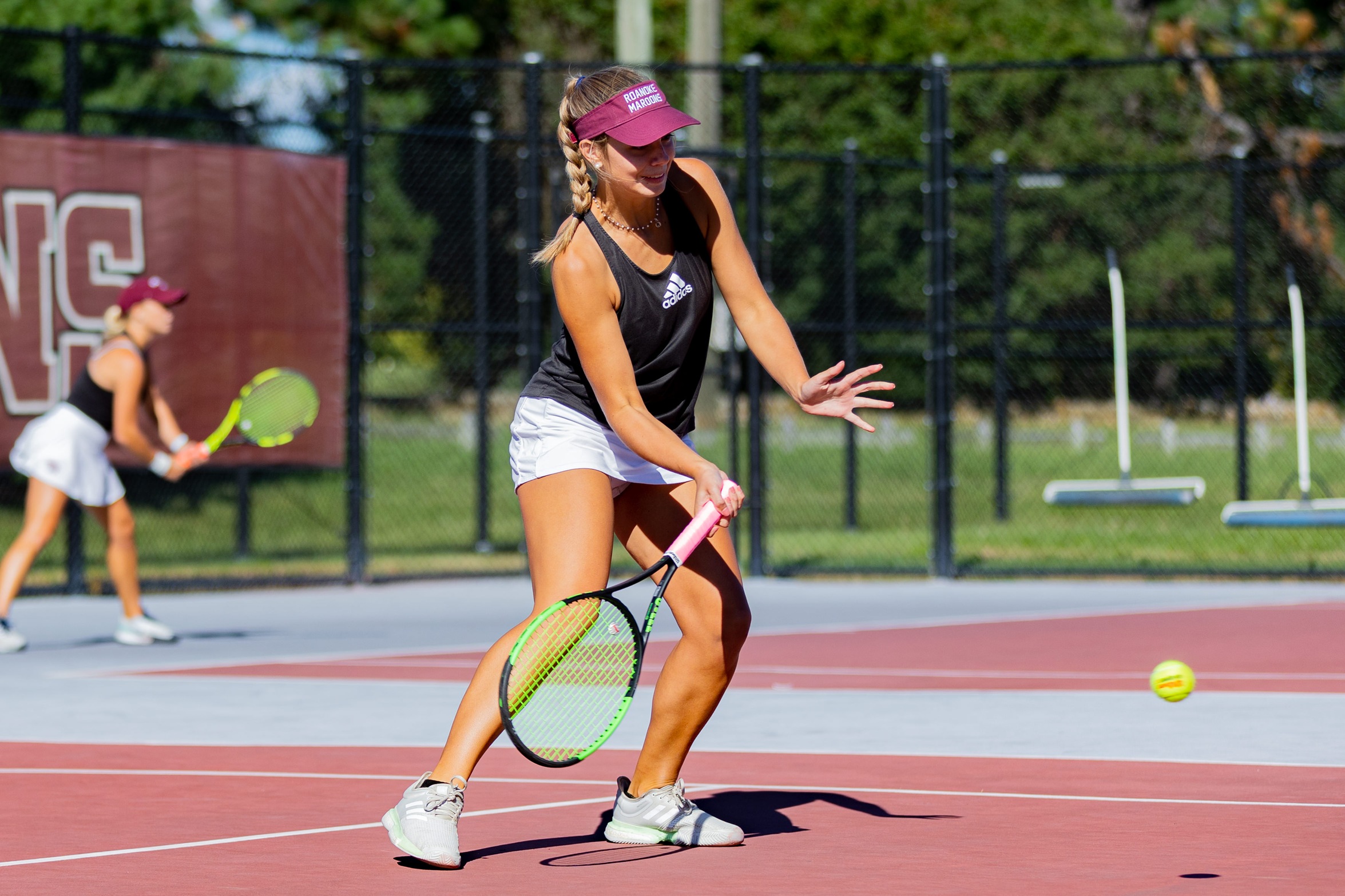 action photo of RC women's tennis player Julia Bassett