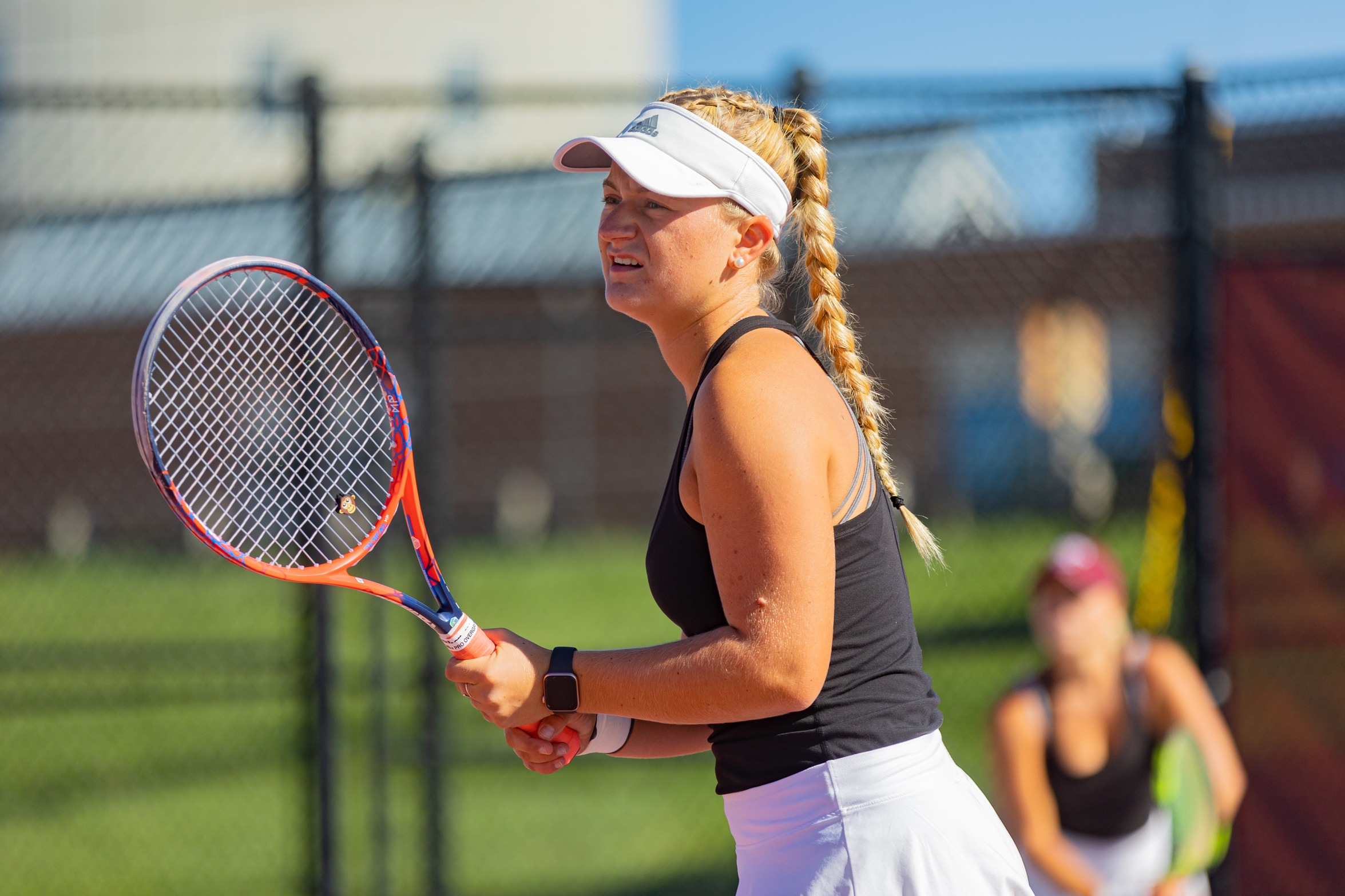 action photo of RC women's tennis player
