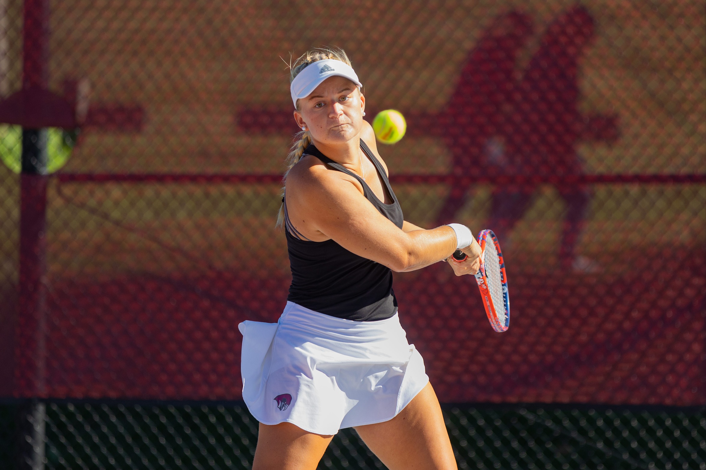 action photo of rc women's tennis player