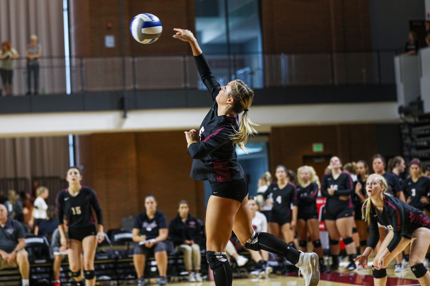 action photo of an attack by RC volleyball player Linsey Bailey