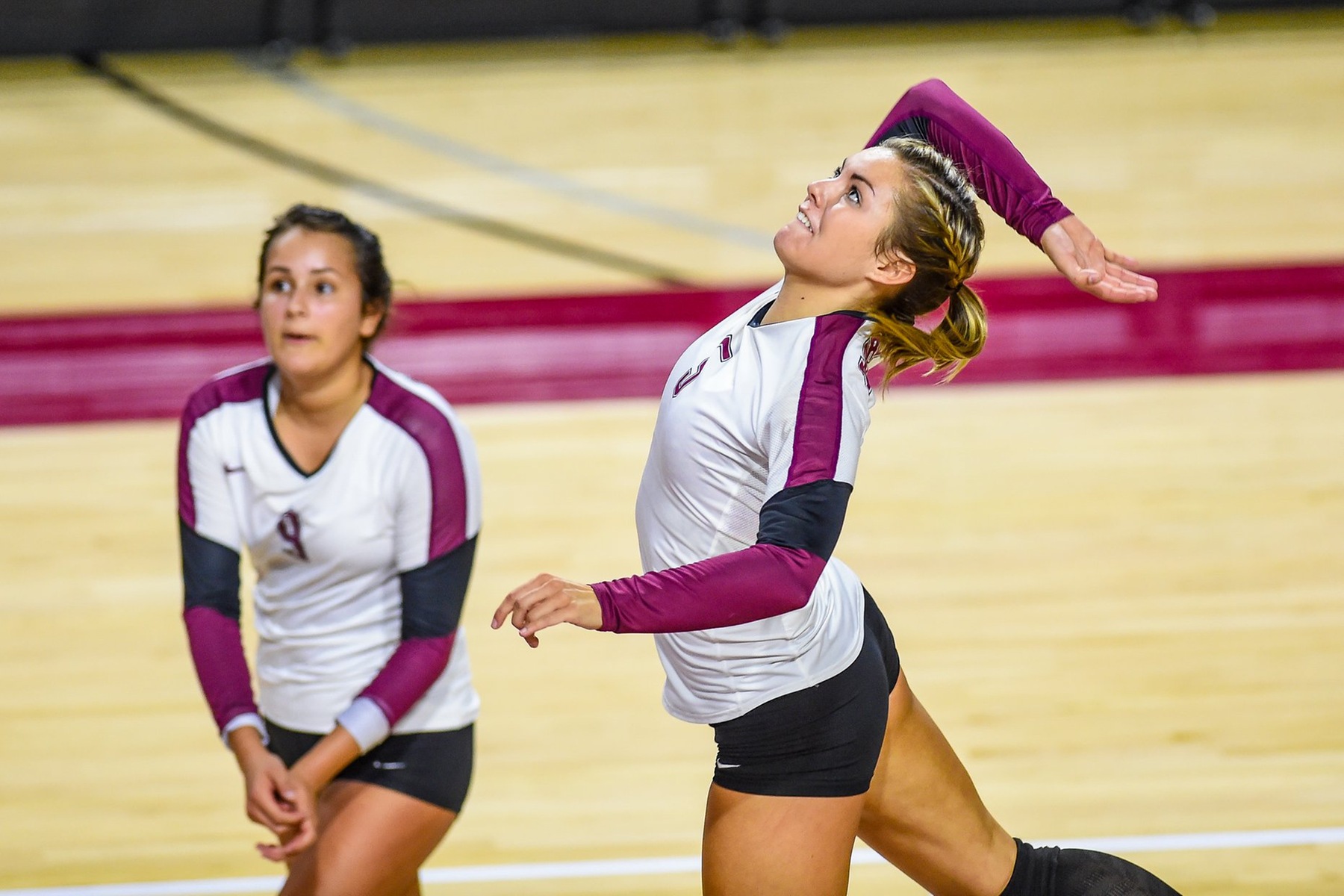 action photo of Linsey Bailey attacking the volleyball