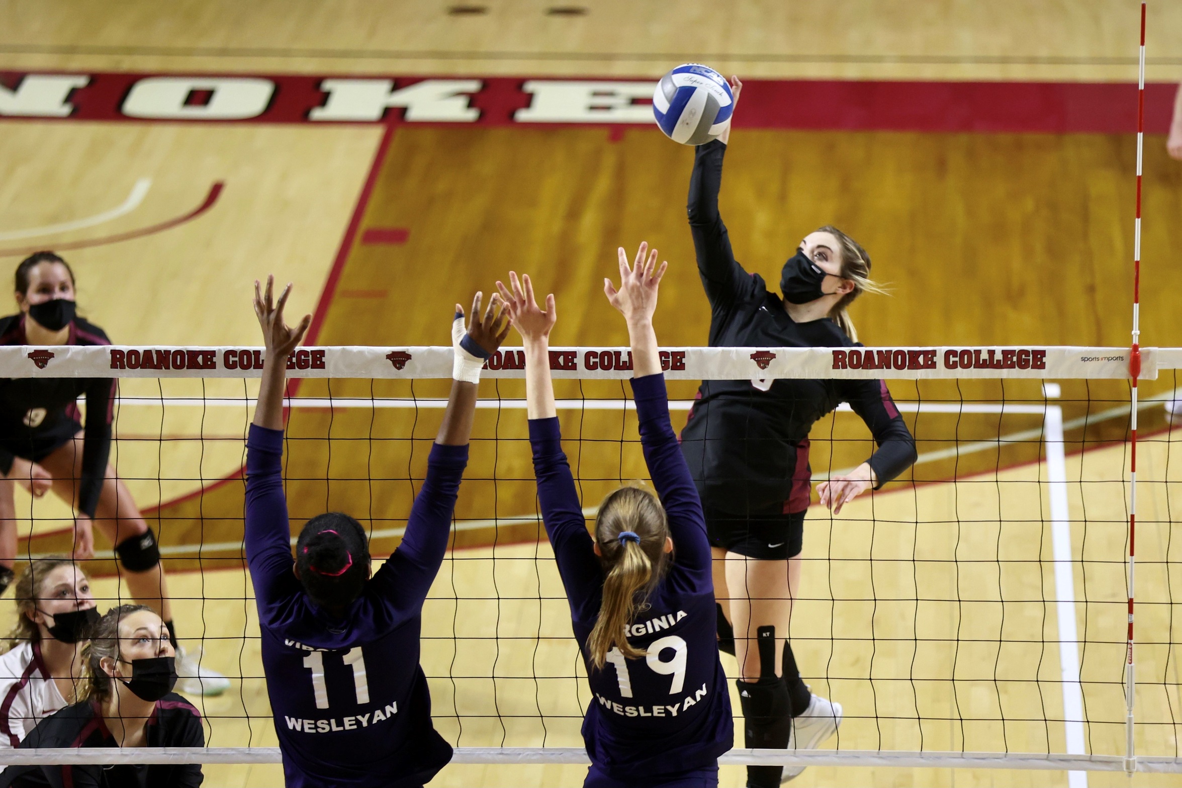 action photo of RC volleyball player Linsey Bailey on the attack