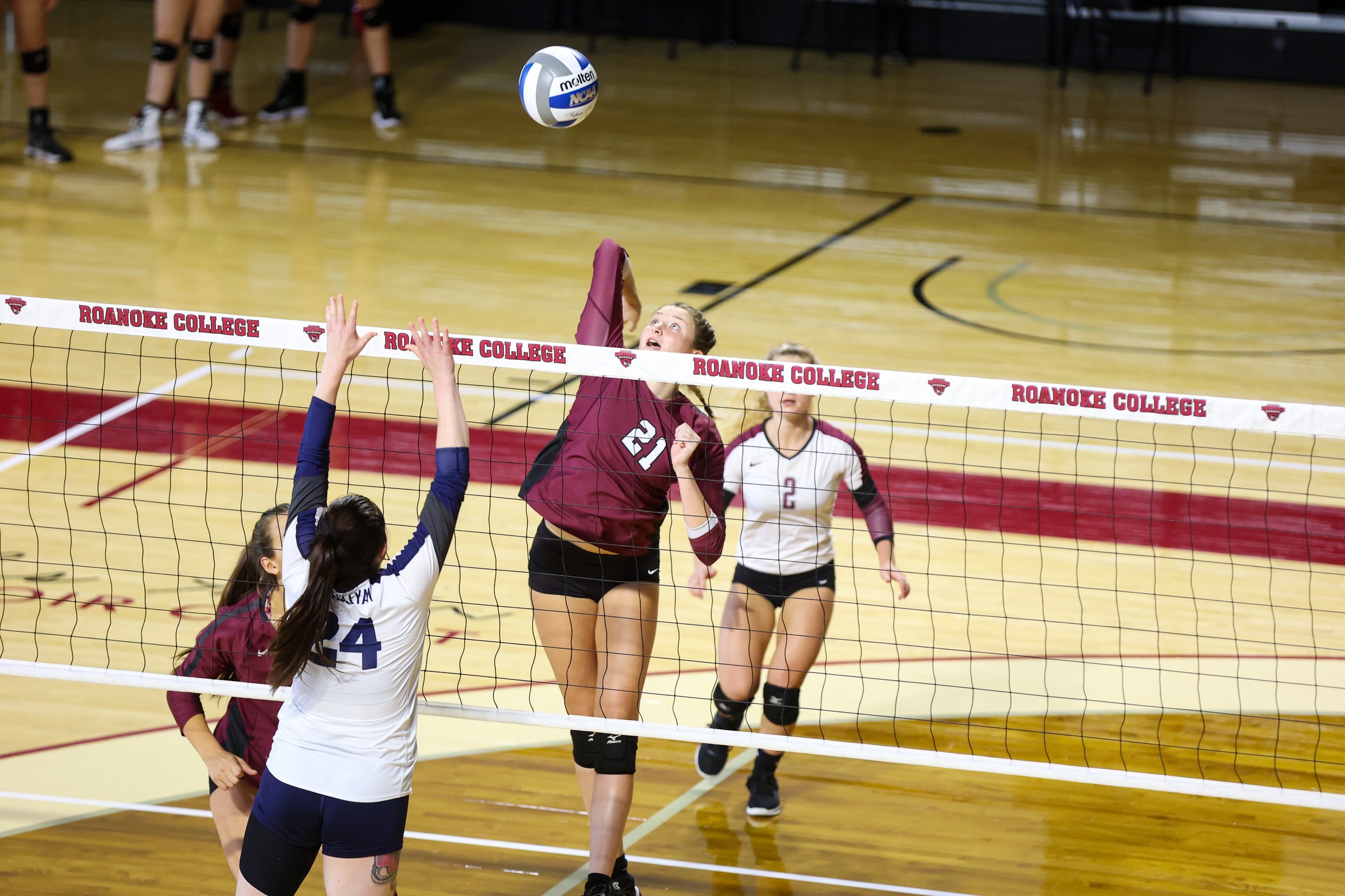 action photo of RC volleyball player Peyton Kirchner with the attack