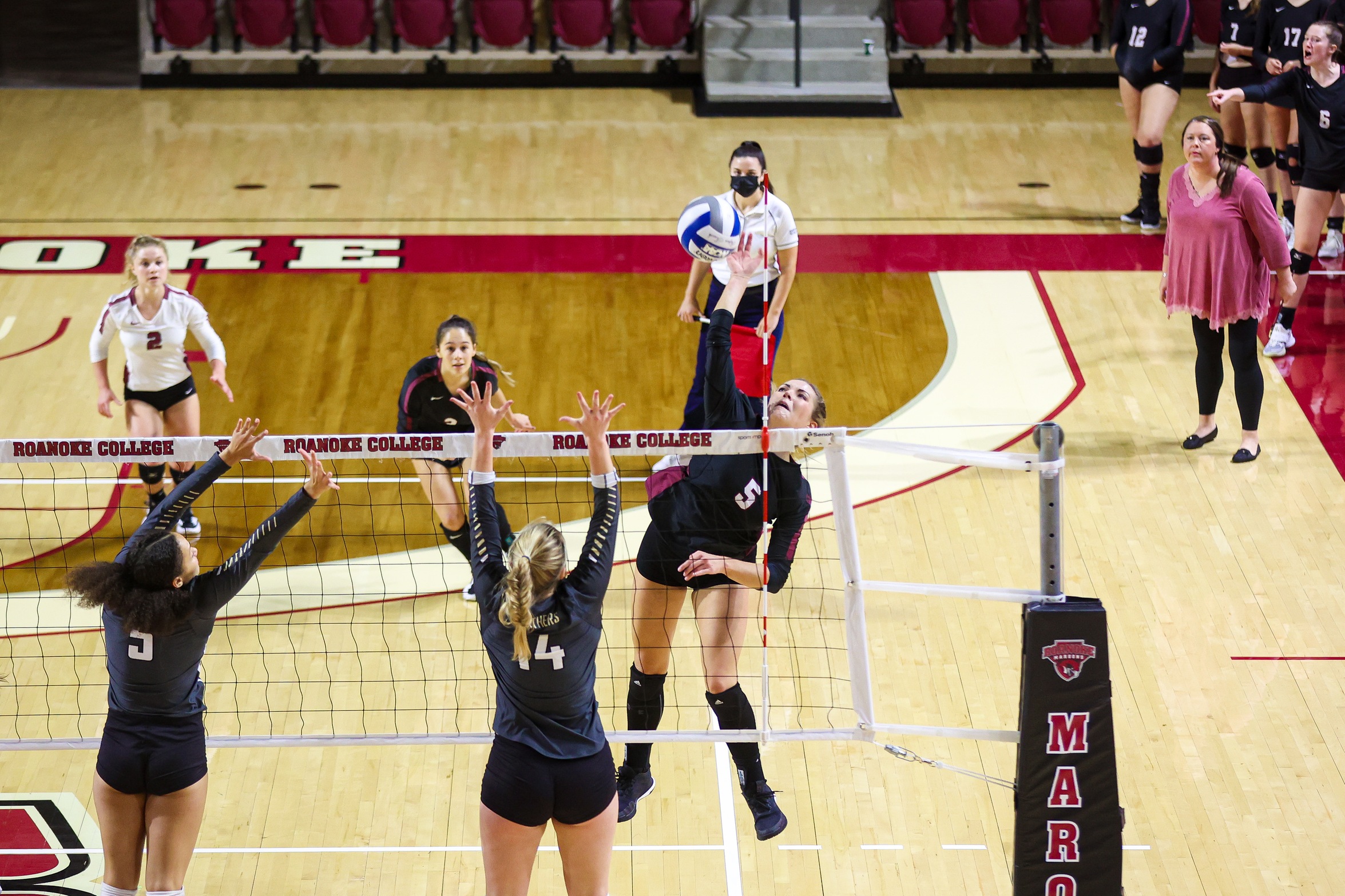 action photo of RC volleyball player Linsey Bailey with the kill